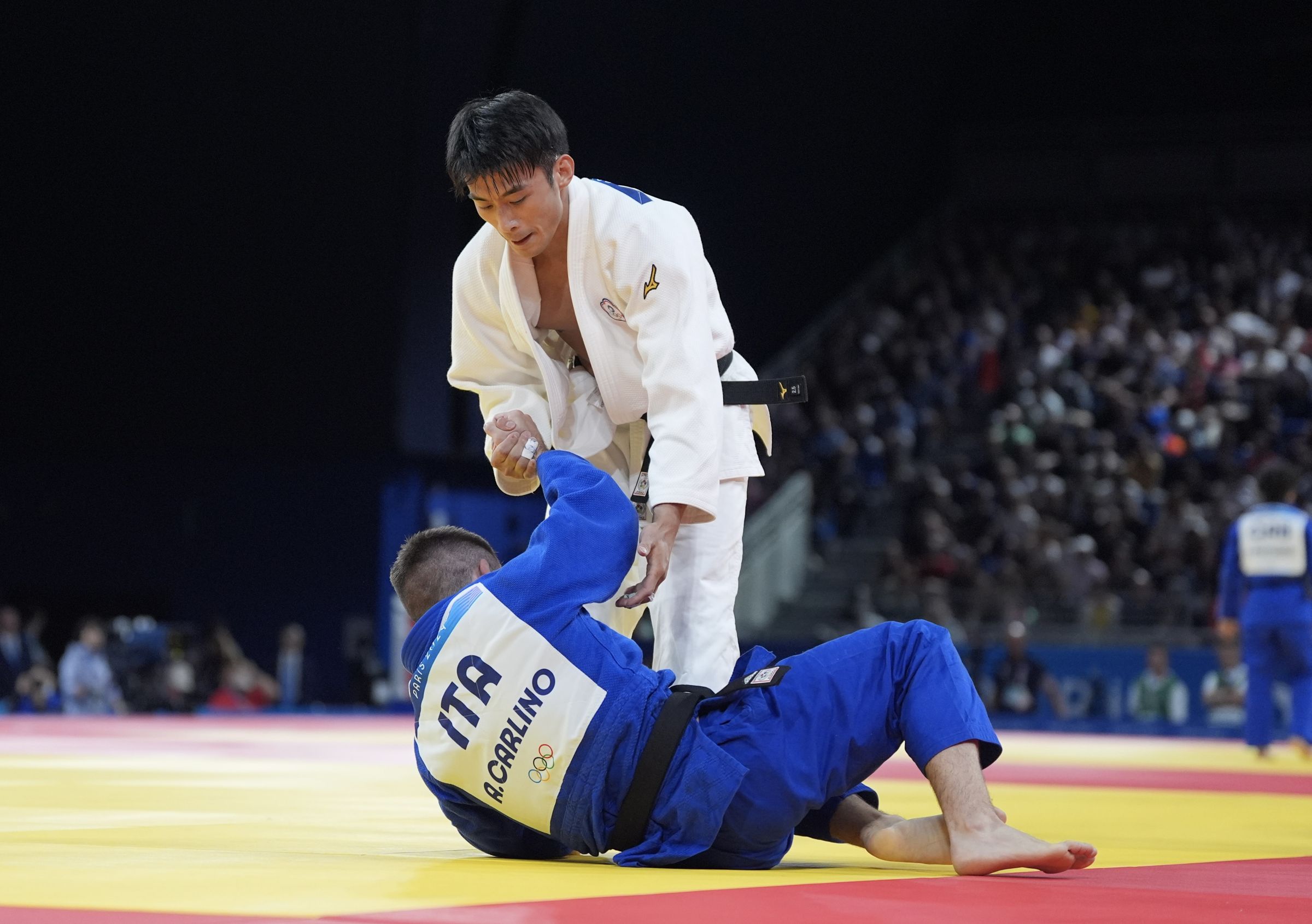 楊勇緯在柔道男子60公斤級16強擊退義大利選手,成功晉級。(中華奧會提供)