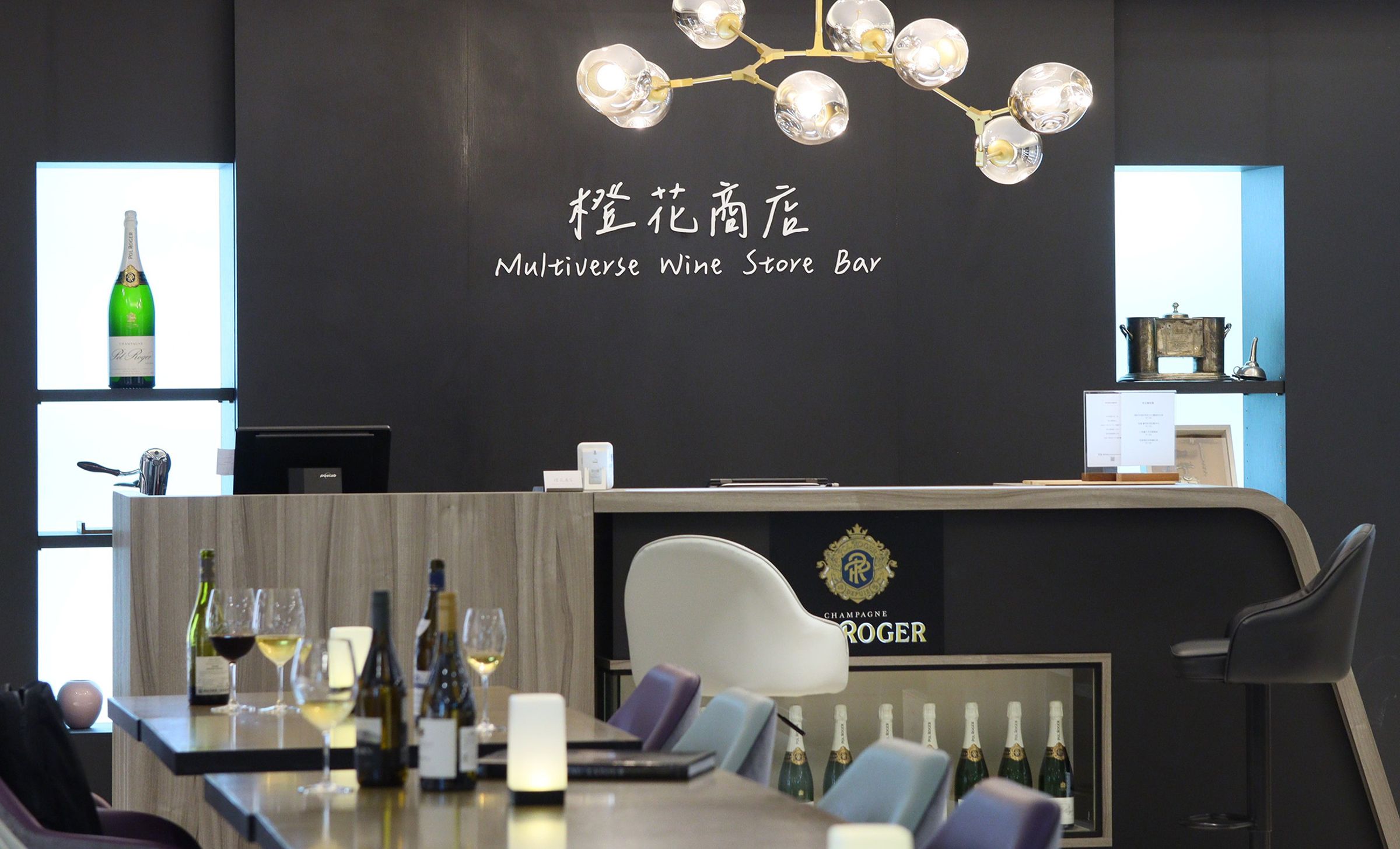 橙花商店座落於茹曦酒店一樓商店街，柔和燈光與木質調氛圍，勾勒出屬於城市的靜謐酒香時光。（橙花商店提供）