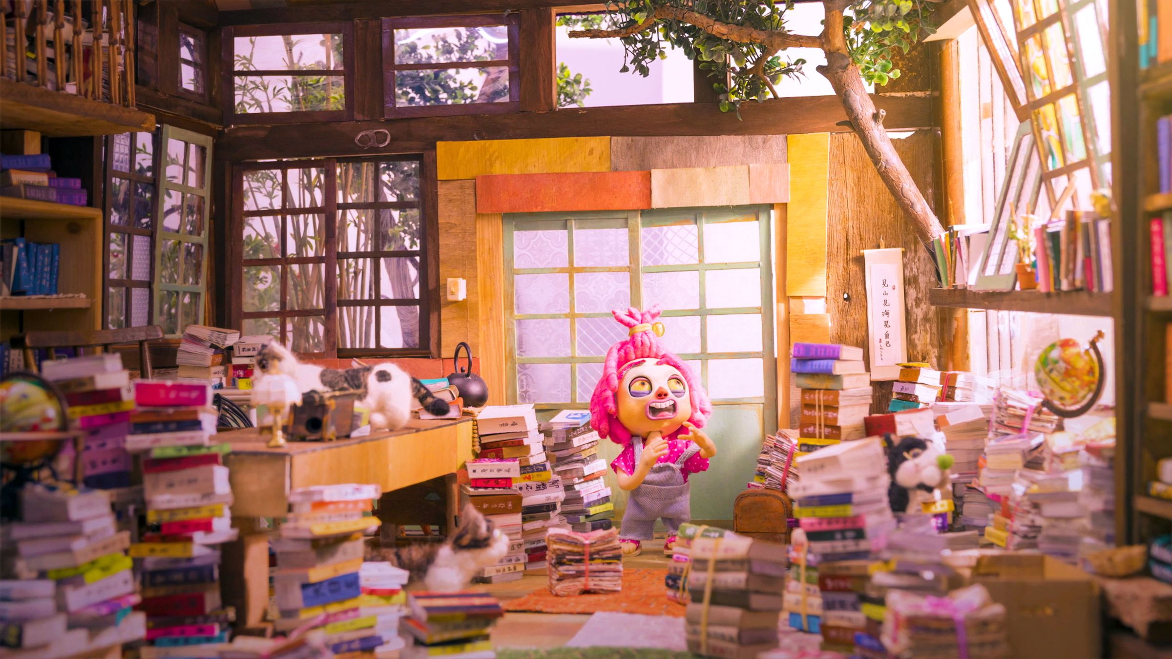 愛書的動畫師張品喻細心打造溫暖的書店,讓憤怒小女孩陳派派一踏入書店就感染到神奇的魔力。(小公視提供)