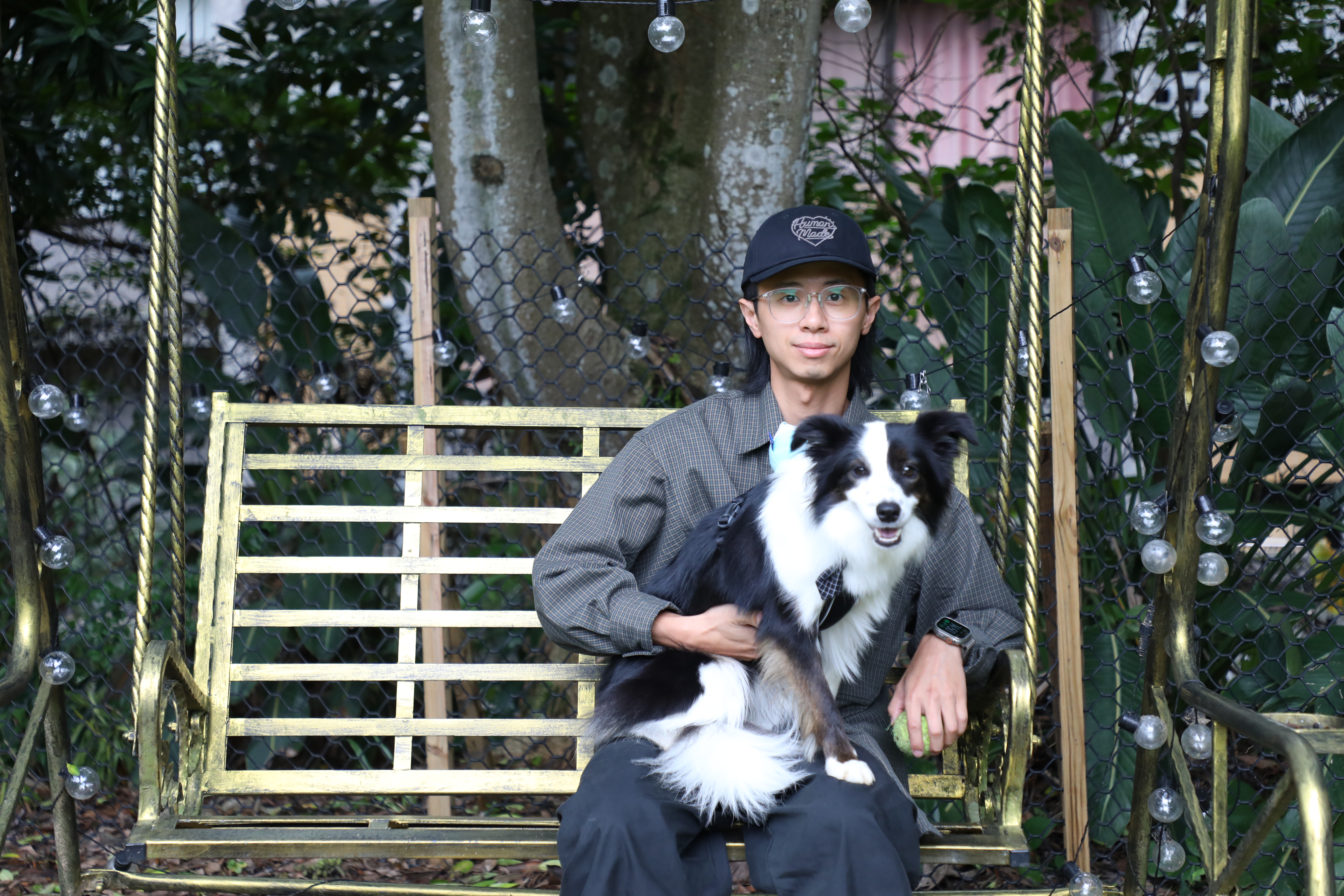 負責人詹育宏Mike與2歲的邊境牧羊犬宮梅春佳。