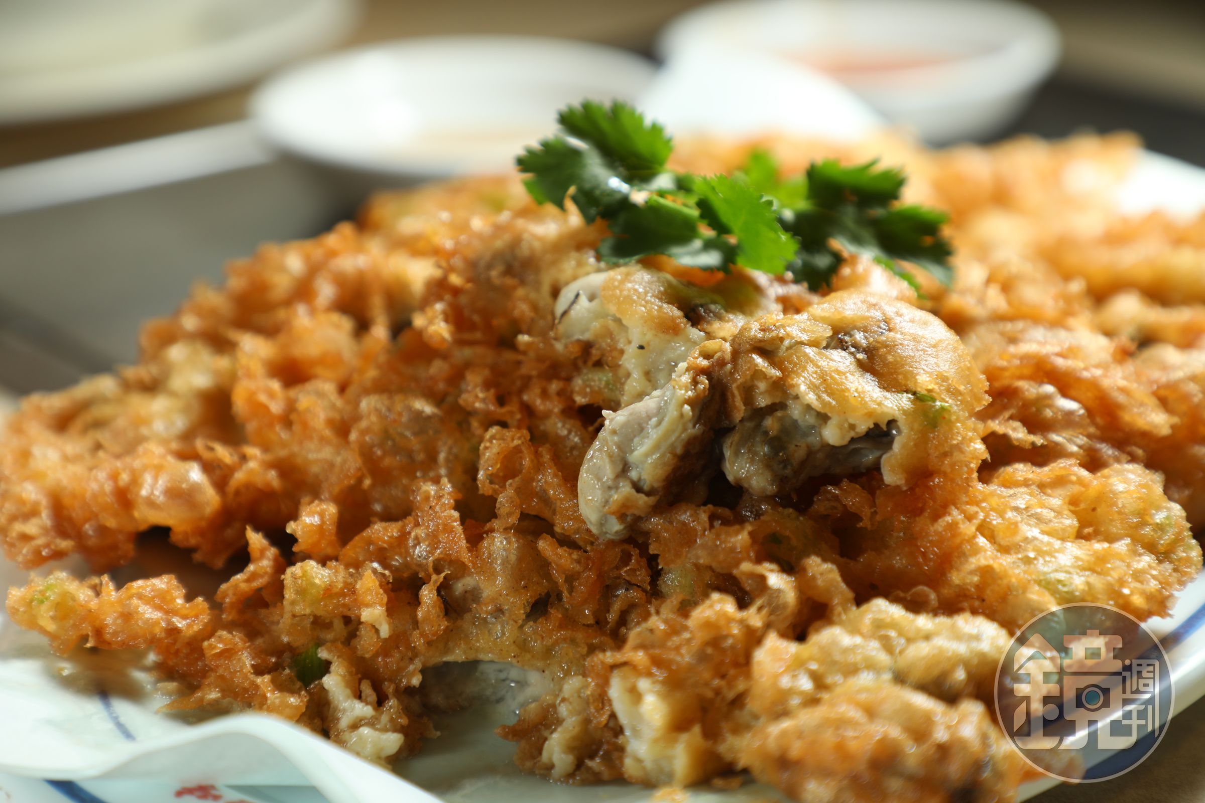 「潮州蠔餅」將牡蠣裹上麵衣油炸，酥脆不油膩。（港幣85元／份）