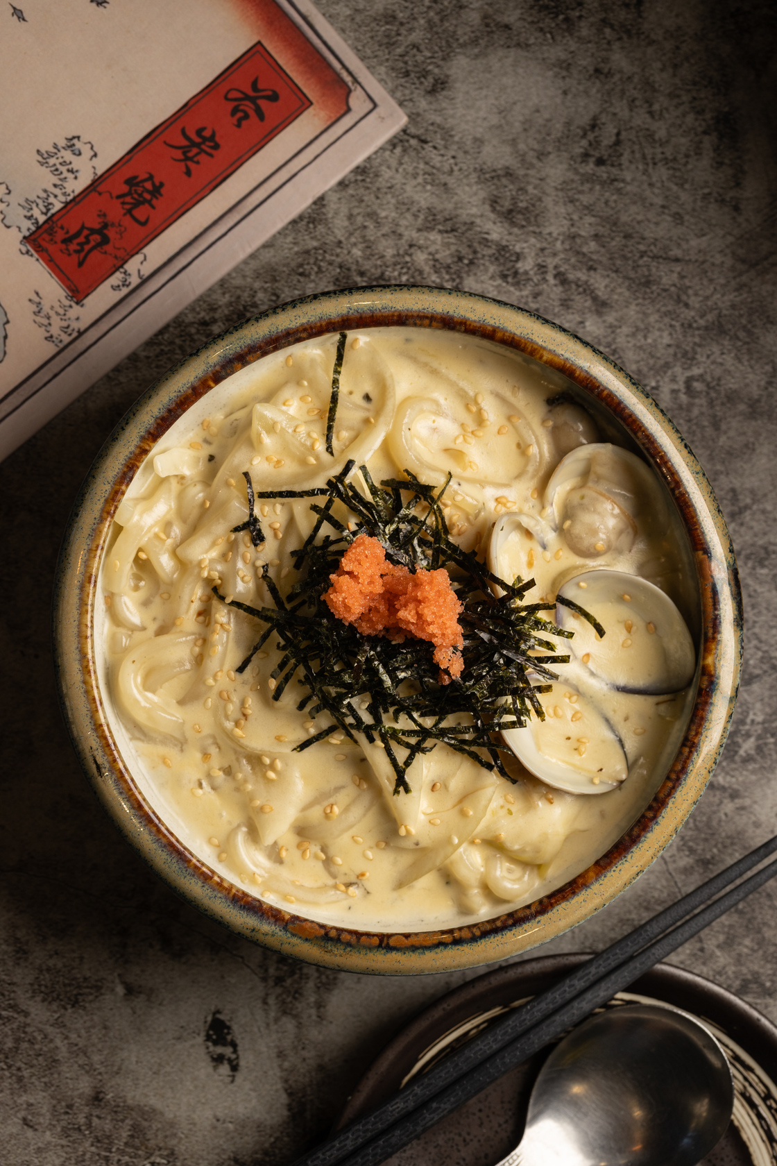 主食「阿肉炒烏龍」以明太子及奶油拌炒，香濃好吃。（220元／份）