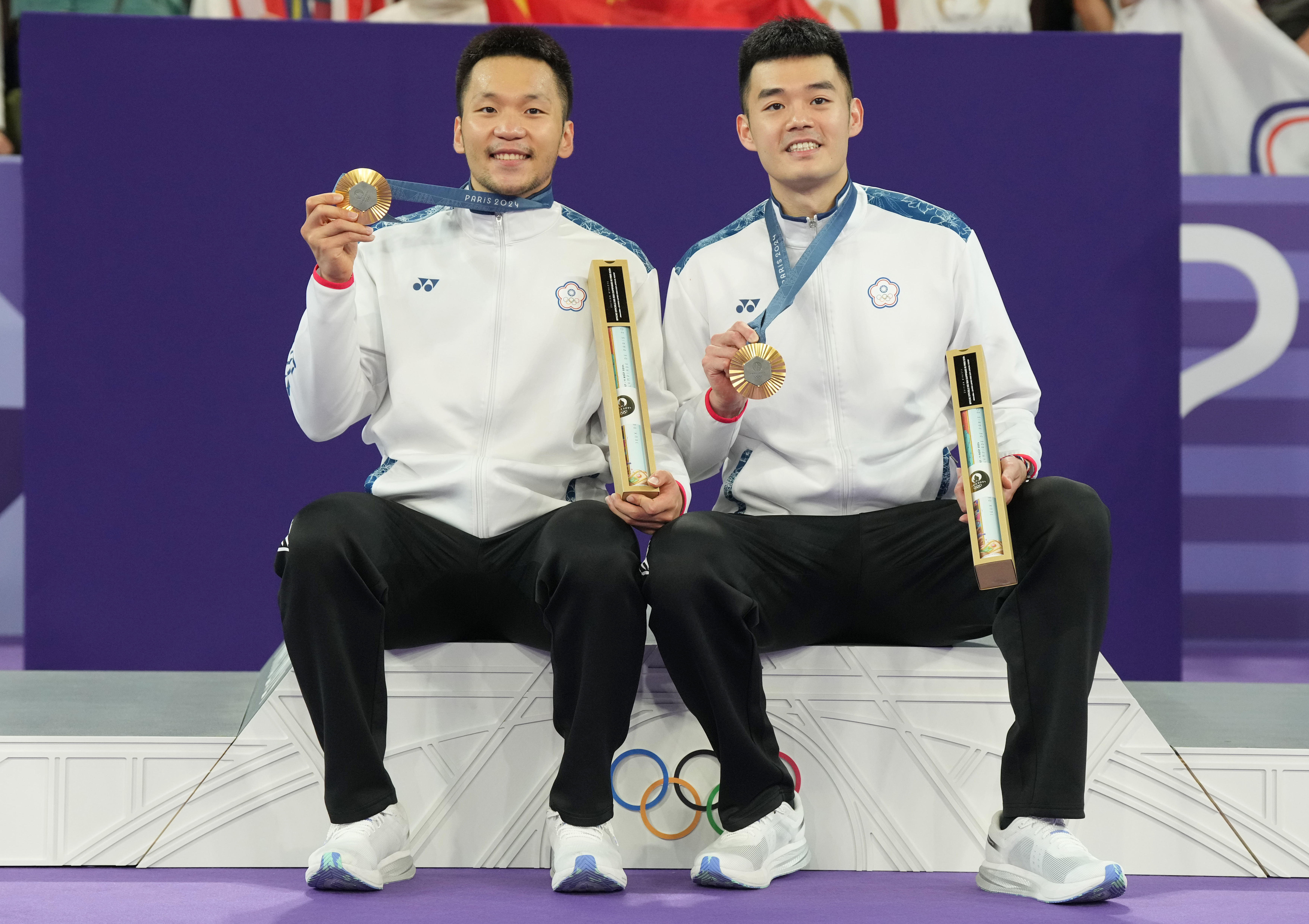 我國羽球黃金男雙李洋、王齊麟昨晚奪下奧運金牌，也締造二連霸紀錄。（中華奧會提供）