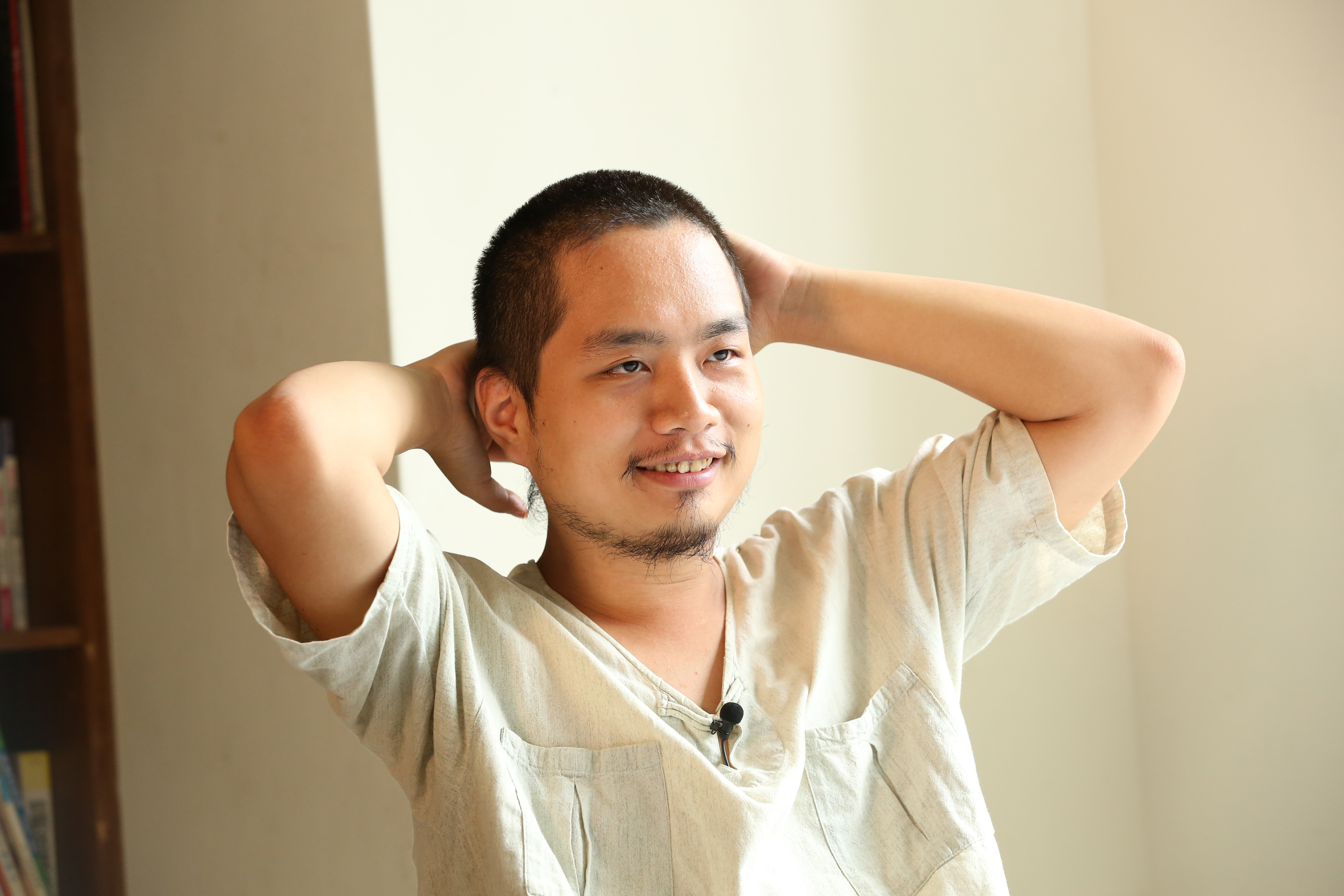 弟弟唐宗浩小三就走上自學之路。他寫的自學2.0平台(we.alearn.org.tw/) 提供諮詢及社群連結。(攝影:賴智揚)