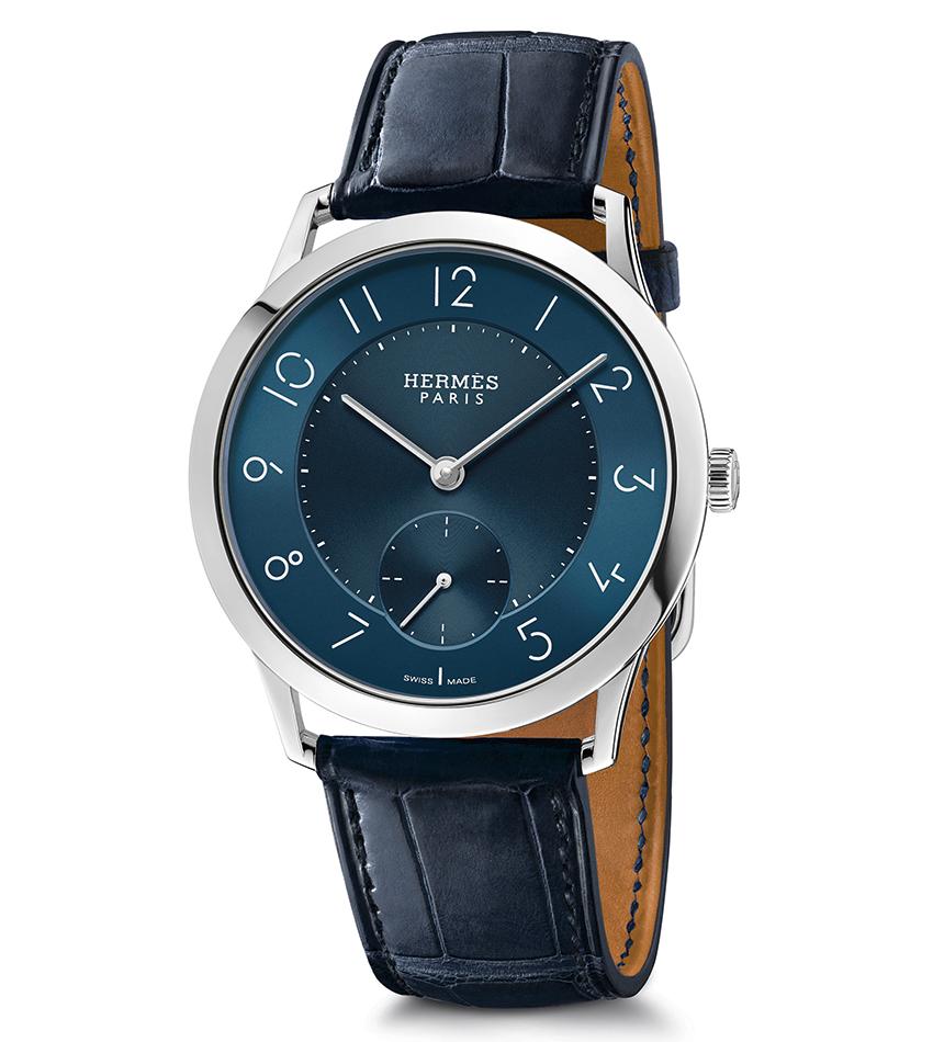 Slim d’Hermès 圓潤纖薄的錶殼,簡約的時間顯示,Philippe Apeloig獨創的字體讓畫面更加唯美。定價NT$ 254,400。