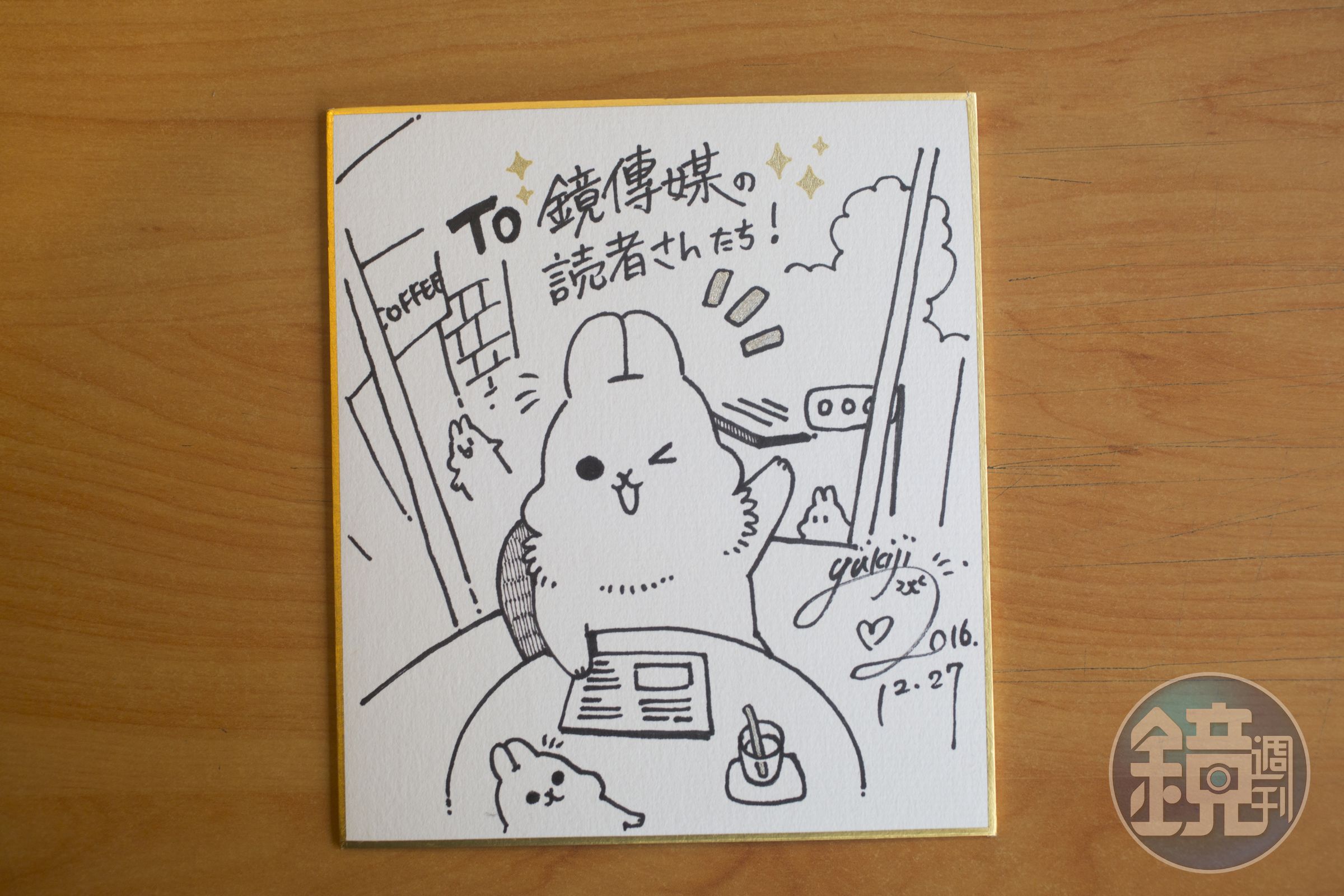 YUKIJI畫圖跟鏡傳媒讀者打招呼。
