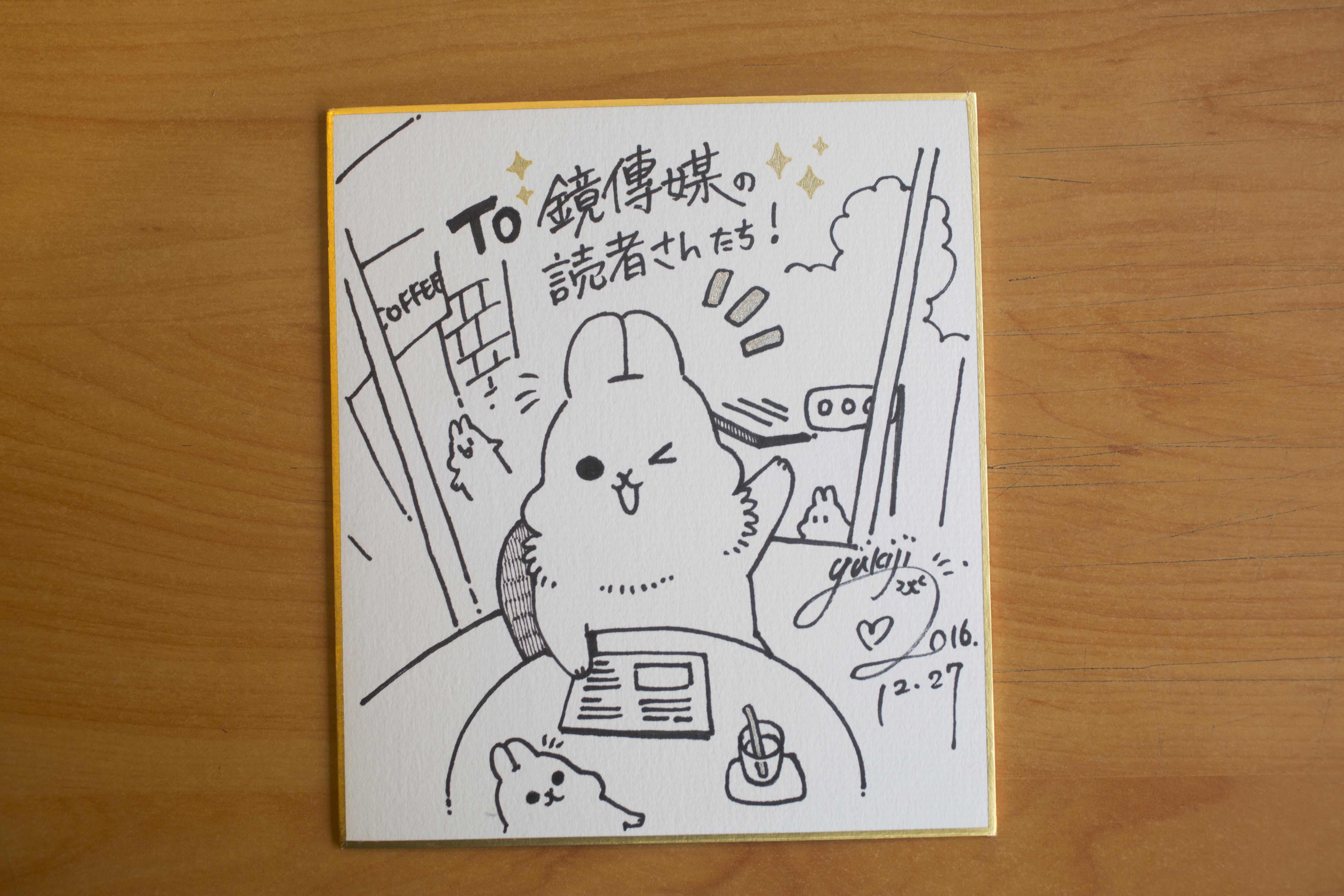 YUKIJI畫圖跟鏡傳媒讀者打招呼。