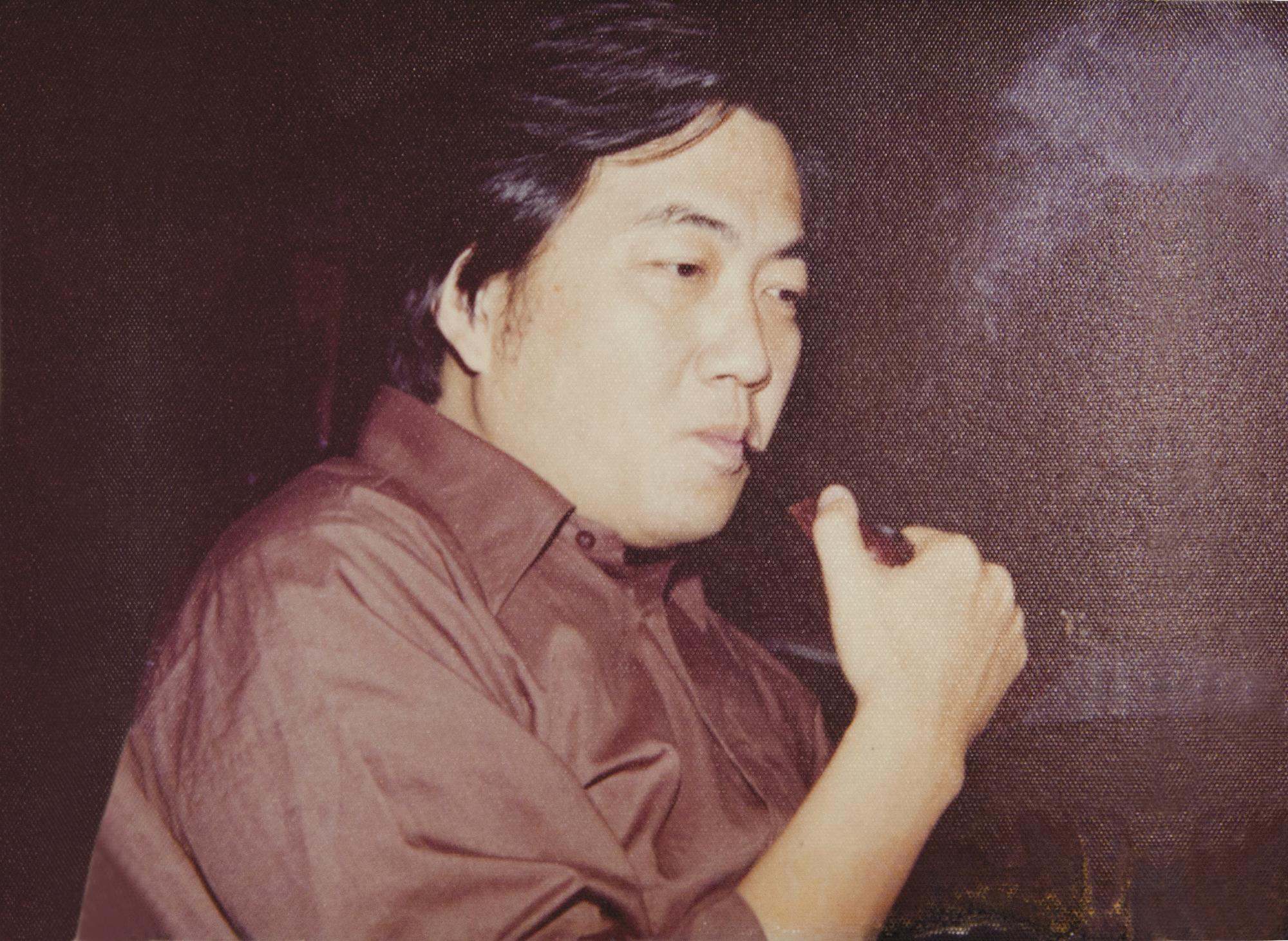 陳映真年輕時高大英俊， 喜抽菸斗。（裴深言提供）