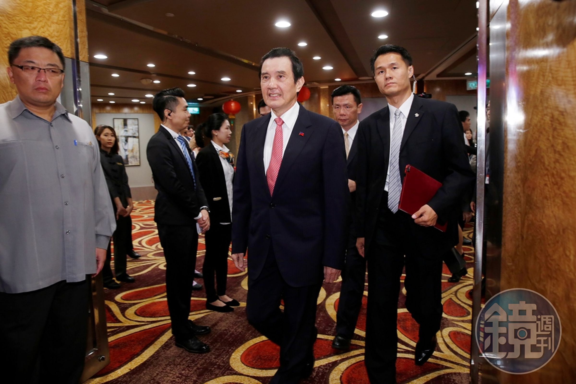 前總統馬英九（中）。