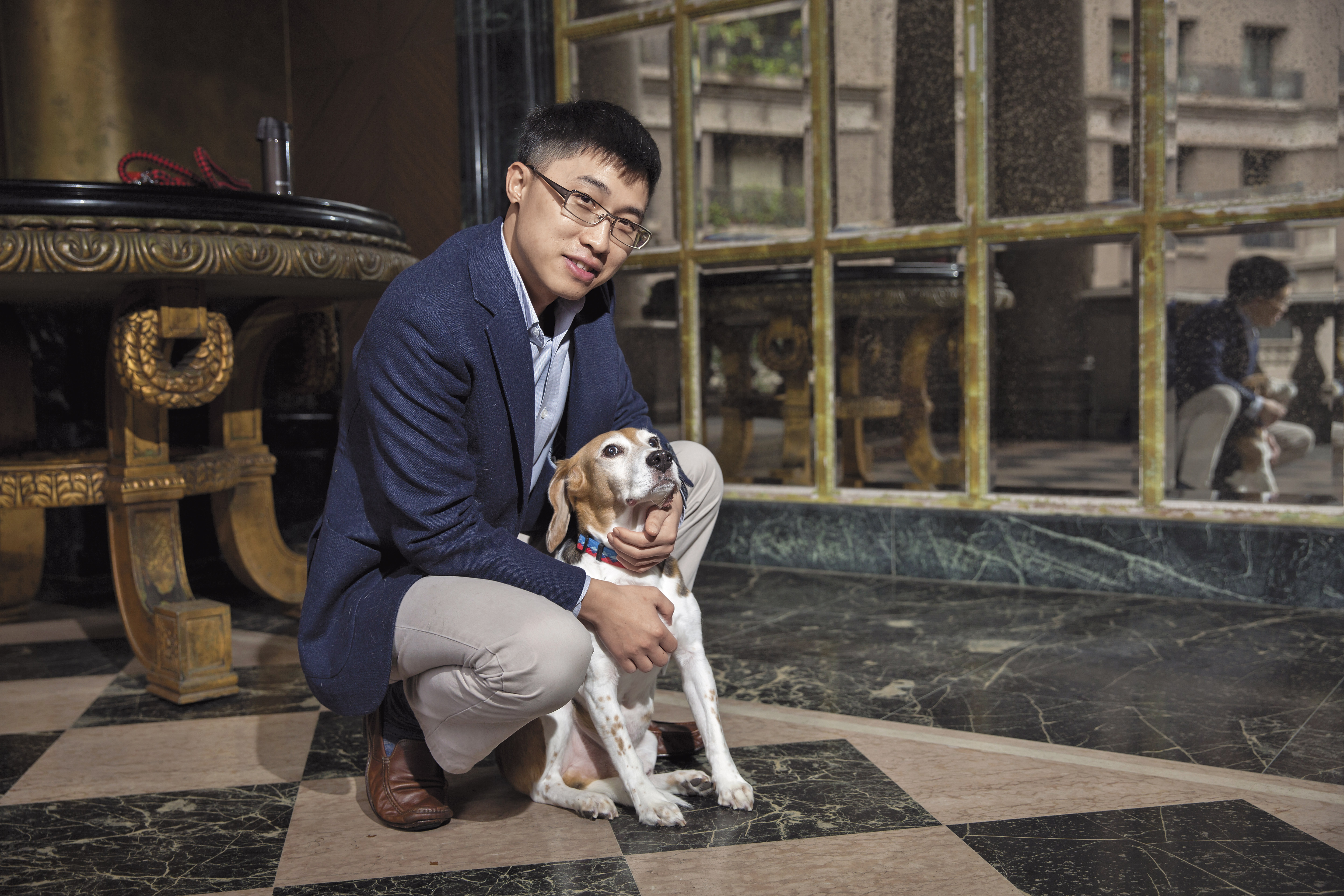 飛飛和飼主張旭辰。