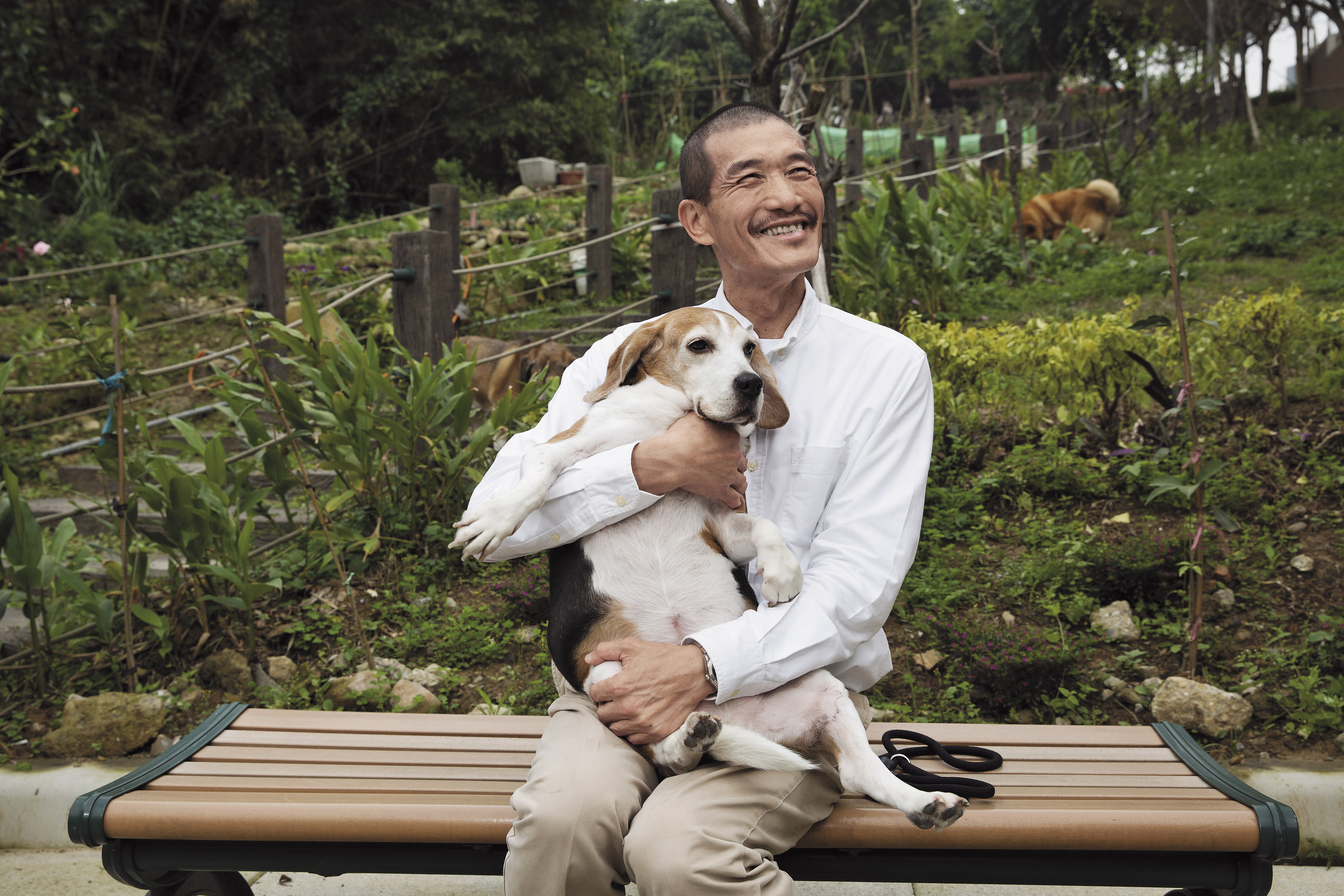 可樂與飼主江榮原。