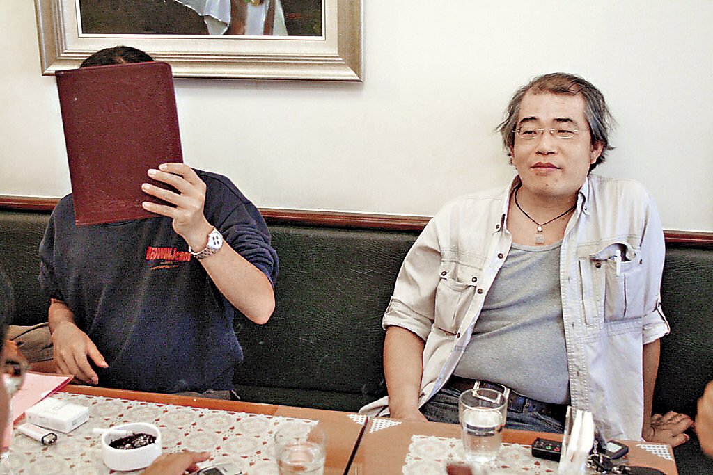 冷尚書(右)身為社工營隊負責人、學運社團督導，在團體內大肆鼓吹情欲解放，是工運染黃的主因。