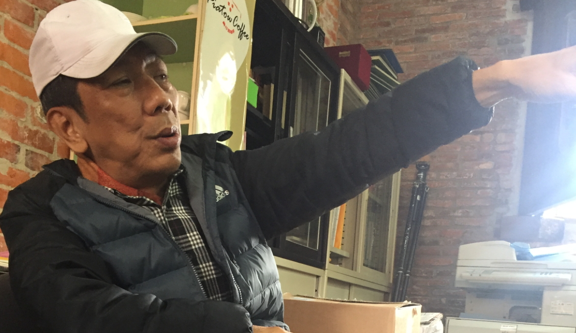  淡水文化基金會研究員顏志新遭控打人，他對此全盤否認。