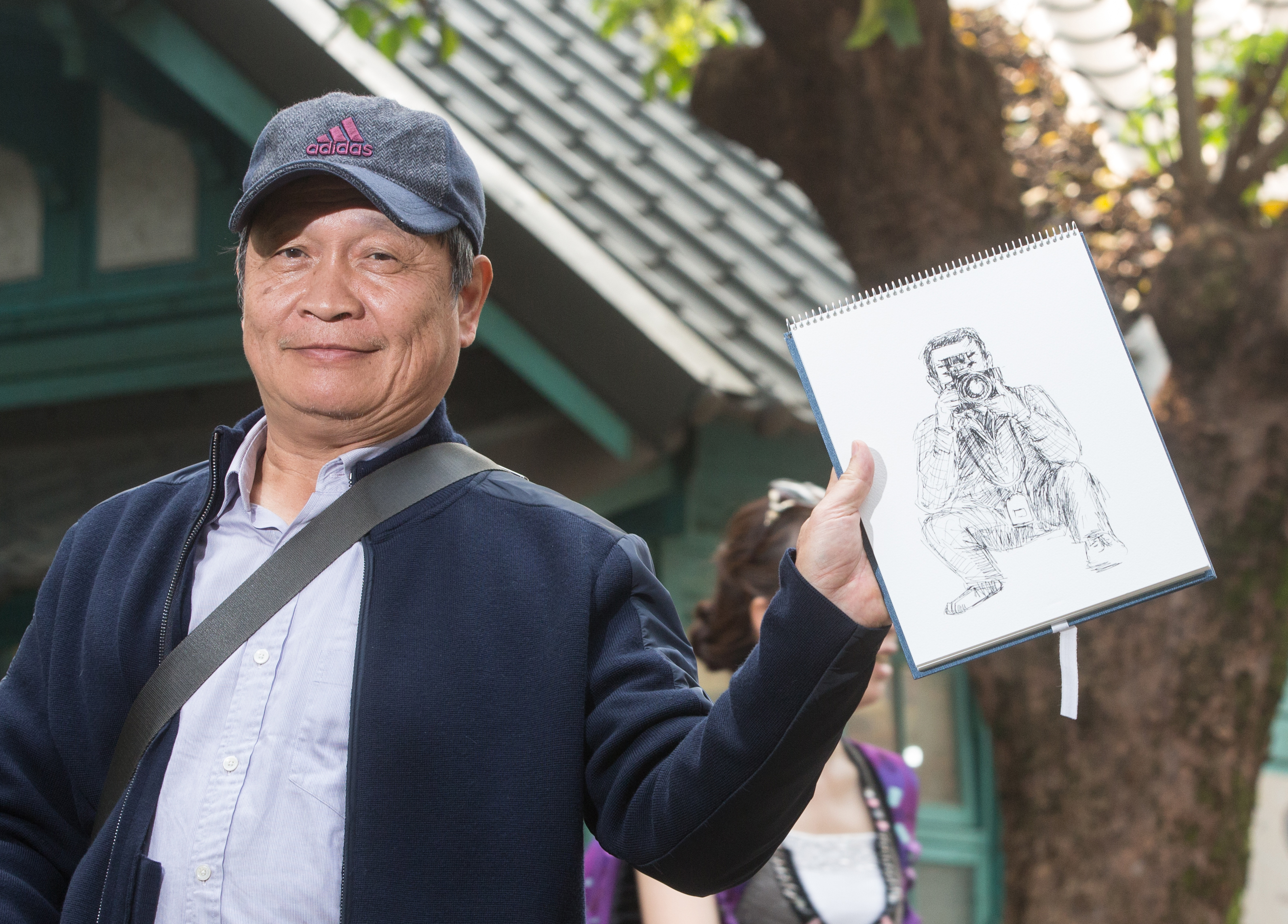 桂冠總經理王正明筆下的鏡週刊攝影記者。