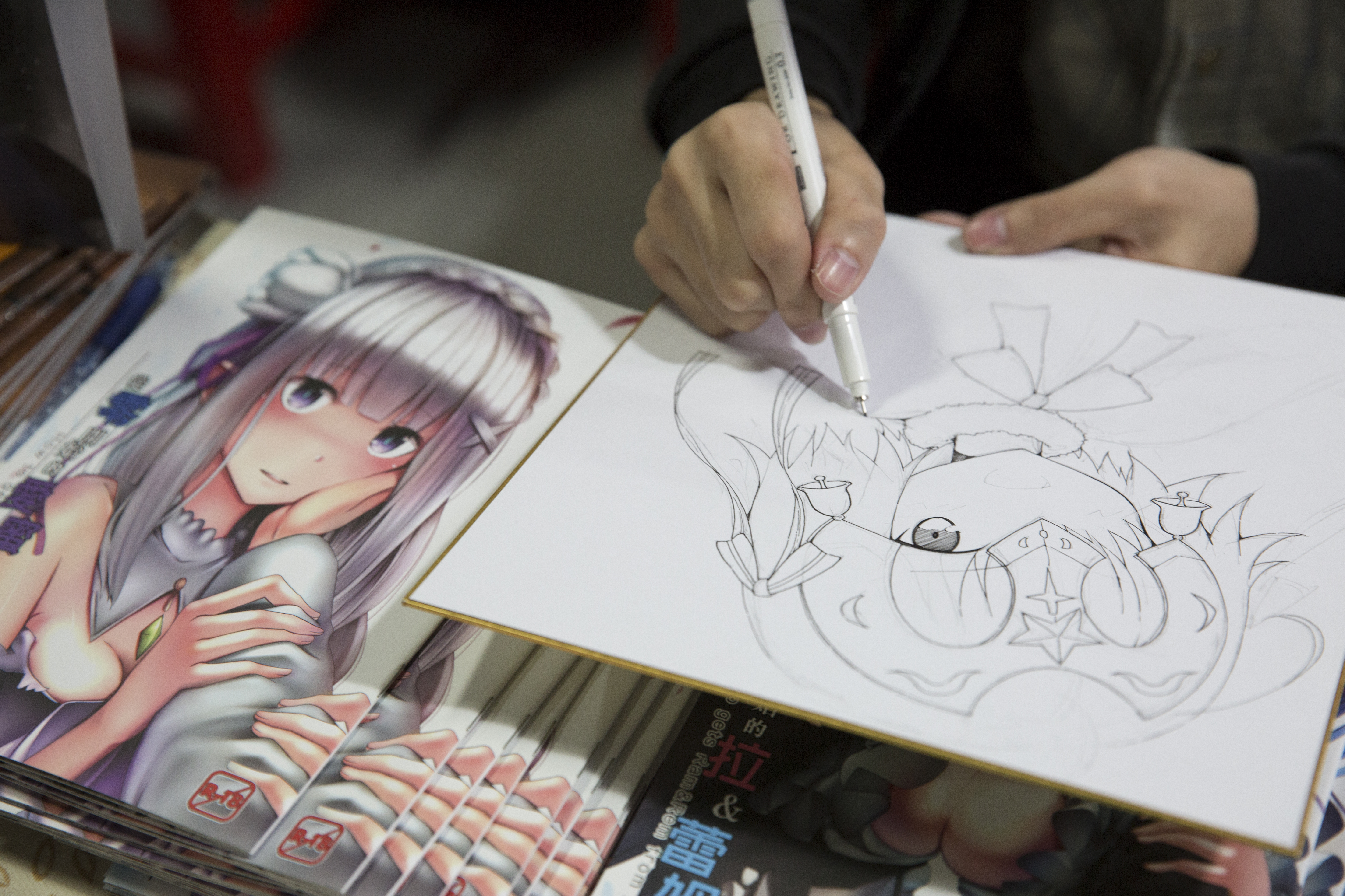 高雄同人場(FFK)上的繪師簽繪。