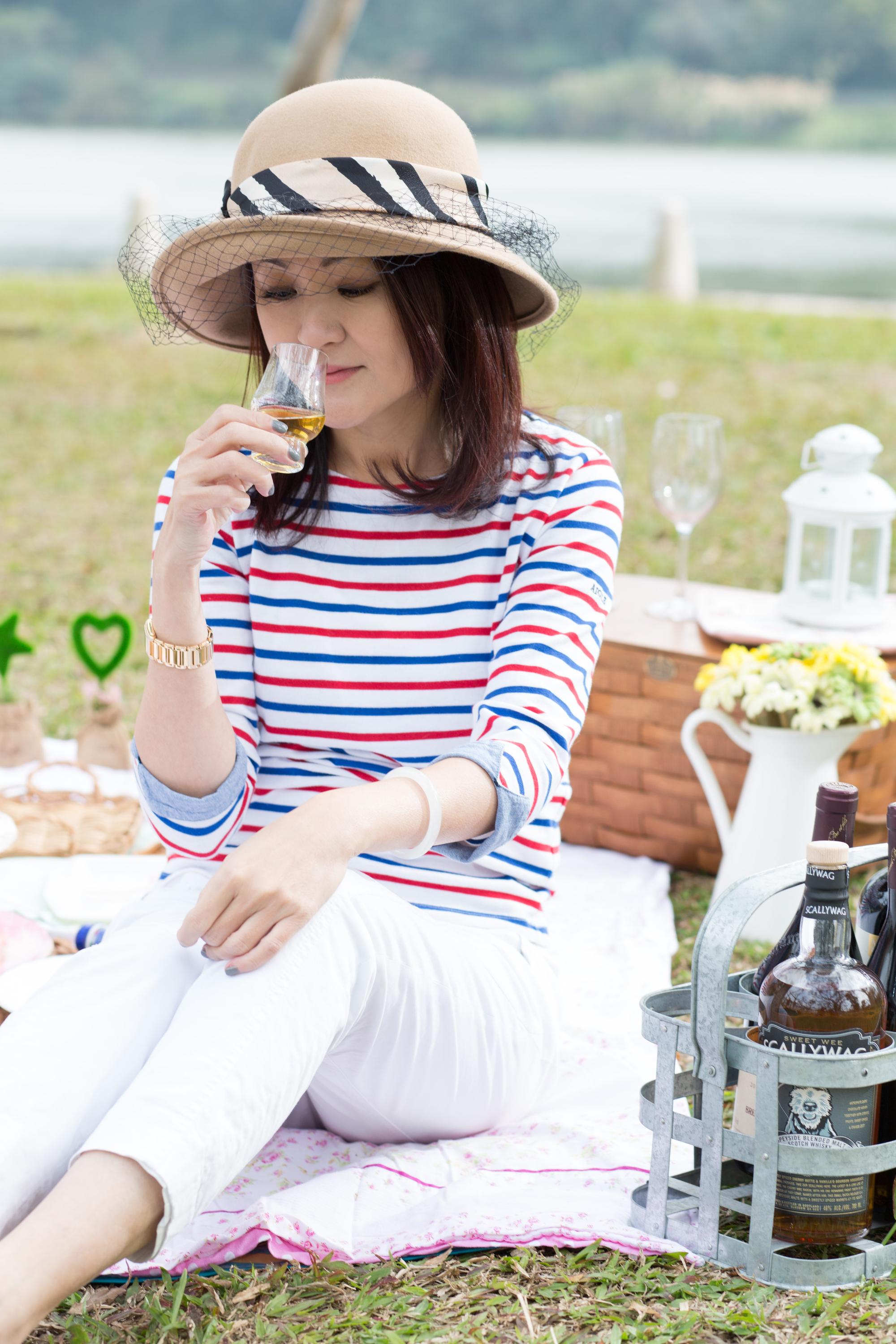威士忌女王李素溶是英國政府任證的精英威士忌學院校長。