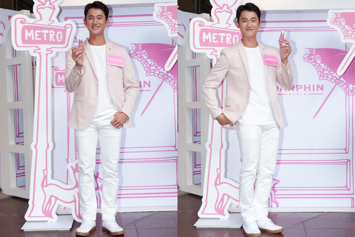 吳慷仁一身粉紅打扮為Darphin 擔任一日店長。