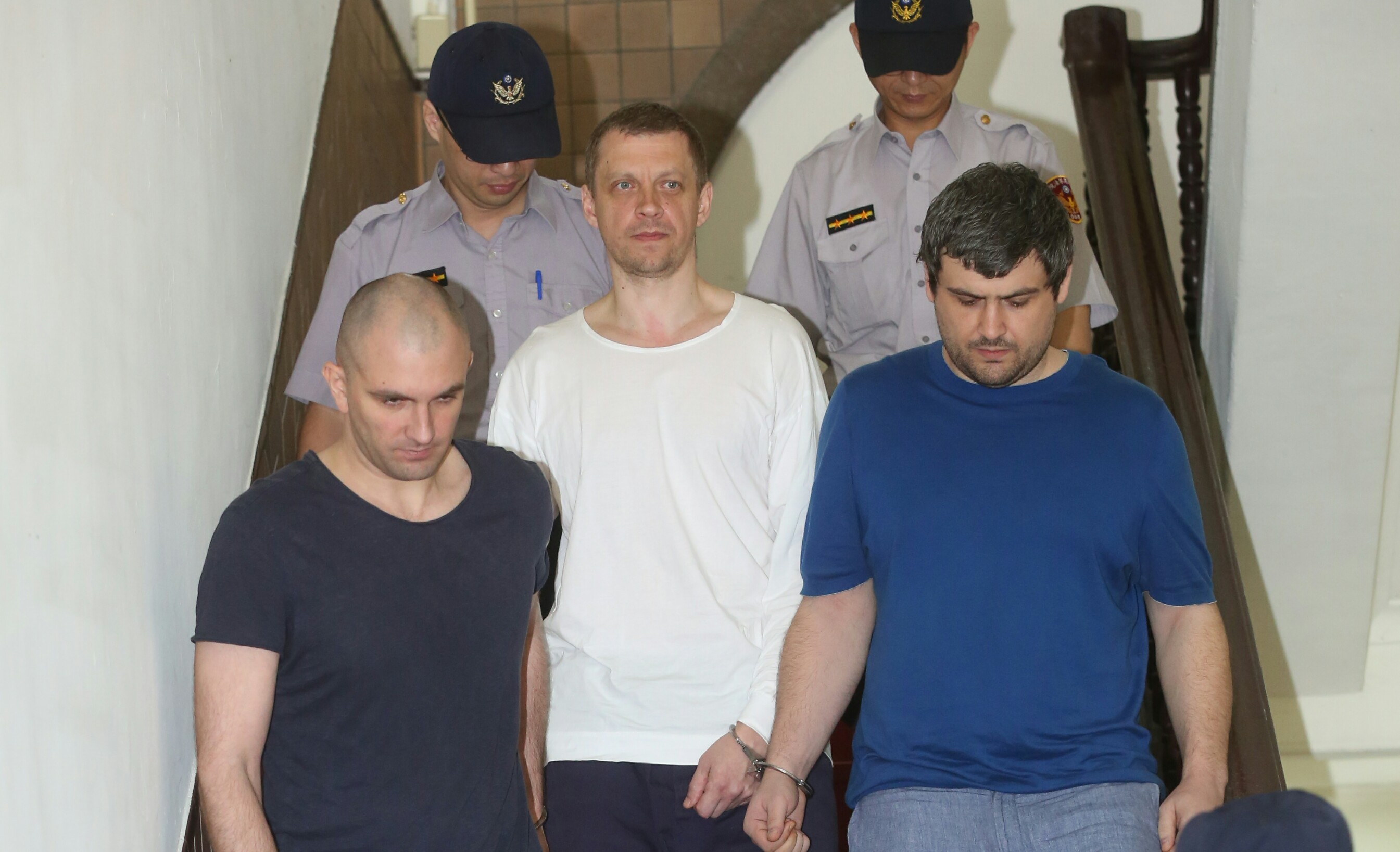 一銀盜領案嫌犯，左起潘可夫、安德魯、米海爾二。