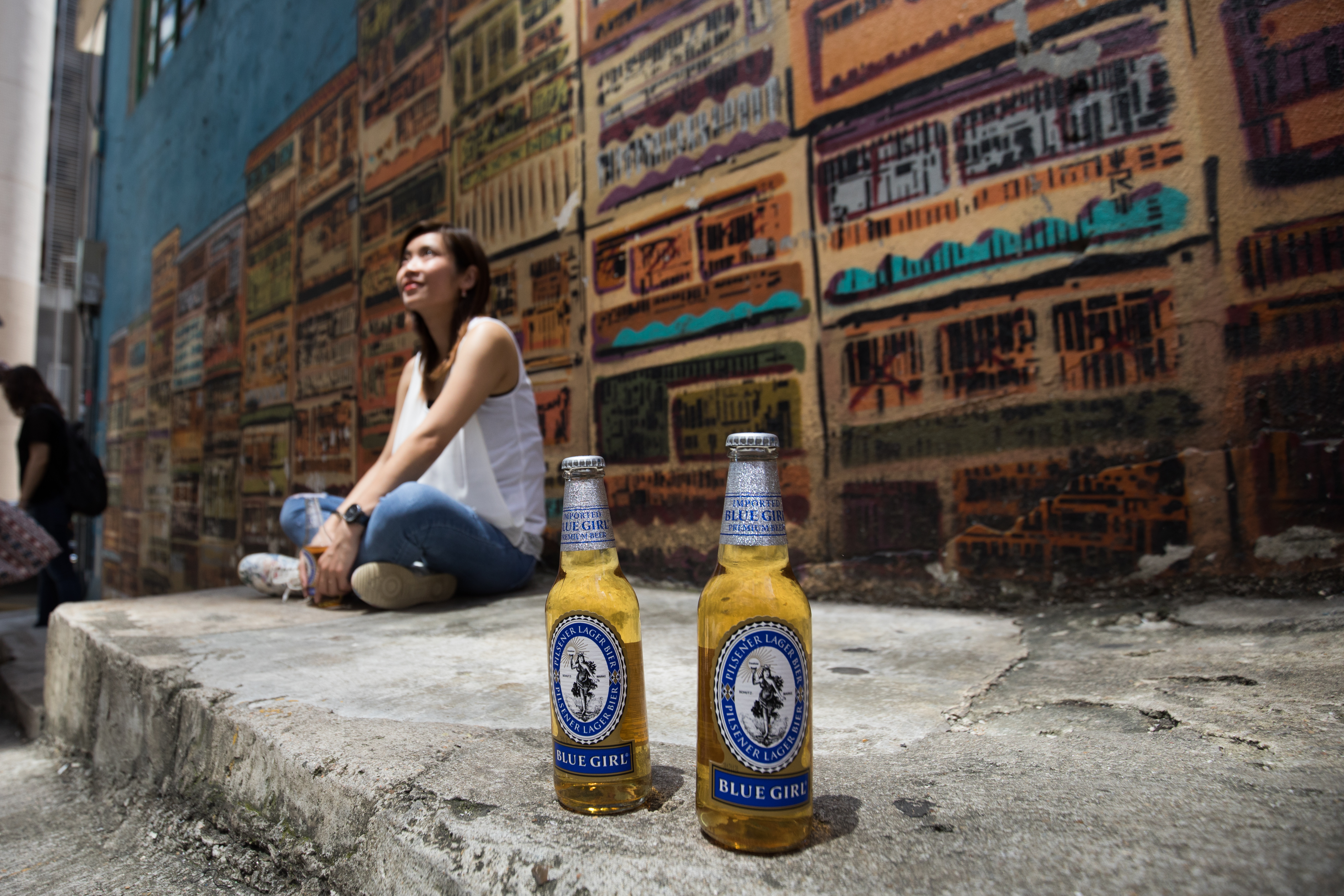 「藍妹啤酒」擁有德國血統，卻是最有香港味道的酒飲，老少都愛勾搭藍妹。