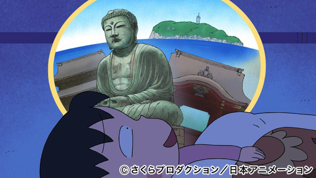 對照片地點非常在意的小丸子。