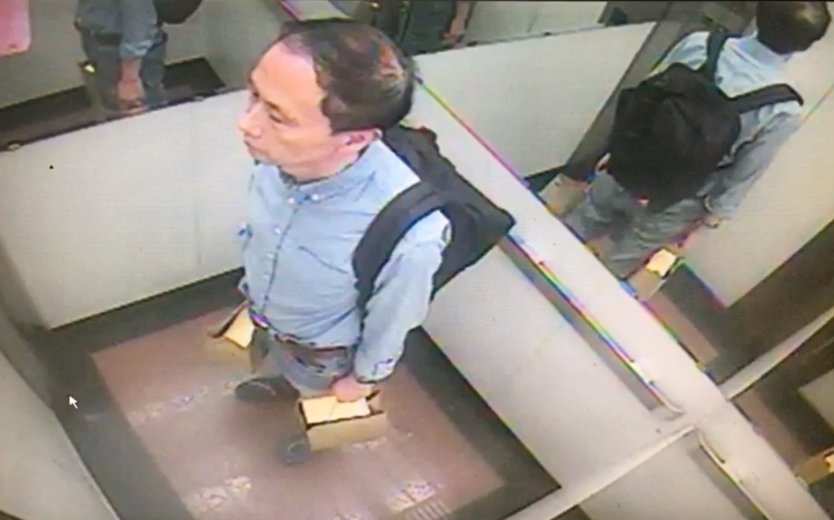 李新最後身影畫面曝光，身穿與議會質詢時相同打扮。（翻攝畫面）