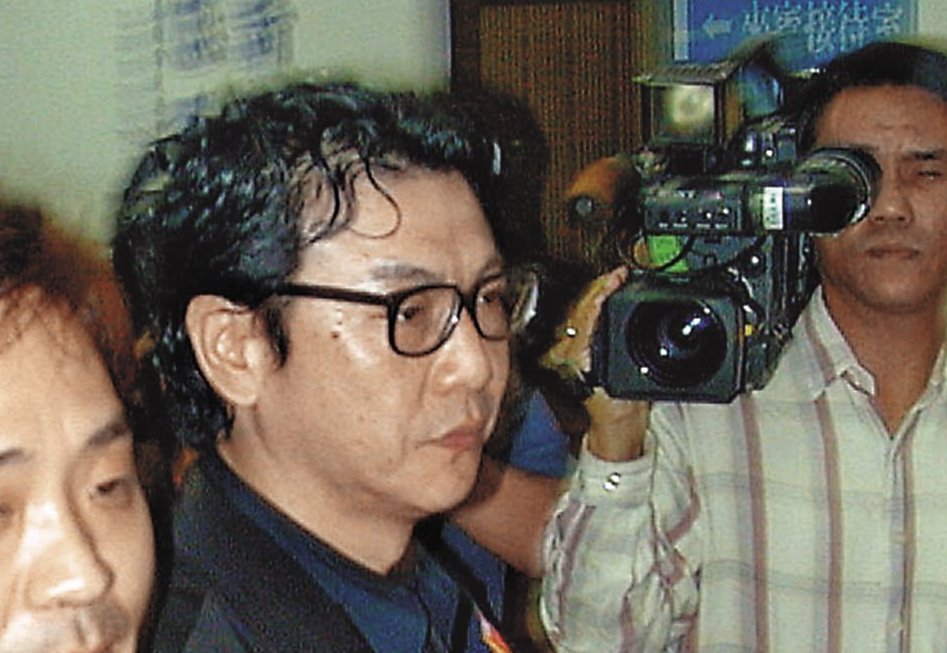 素有「台灣地下金融教父」稱號的萬眾(中),4年前潛逃到大陸。(中央社)