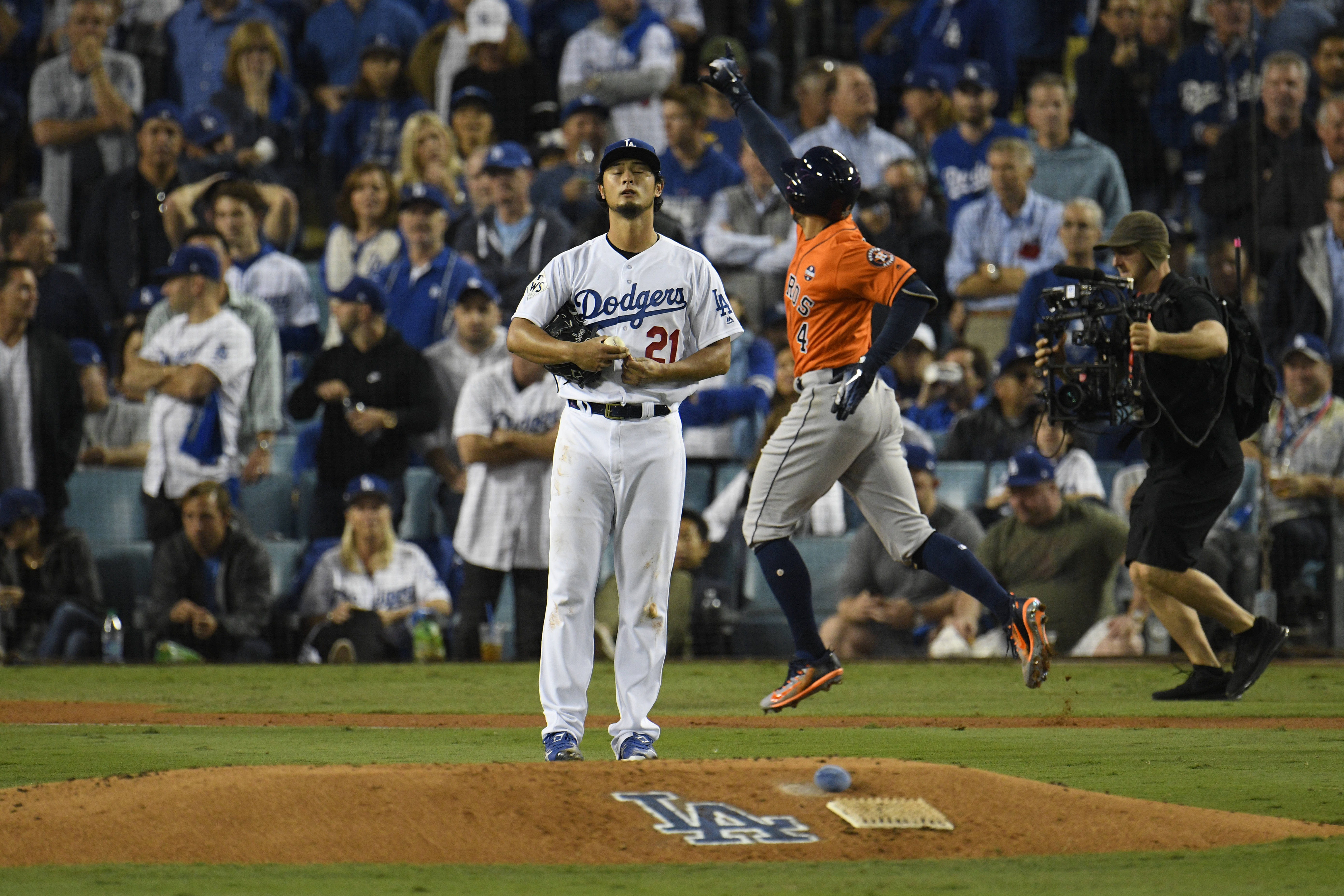 道奇先發投手達比修有投1.2局就被打爆退場。（東方IC）