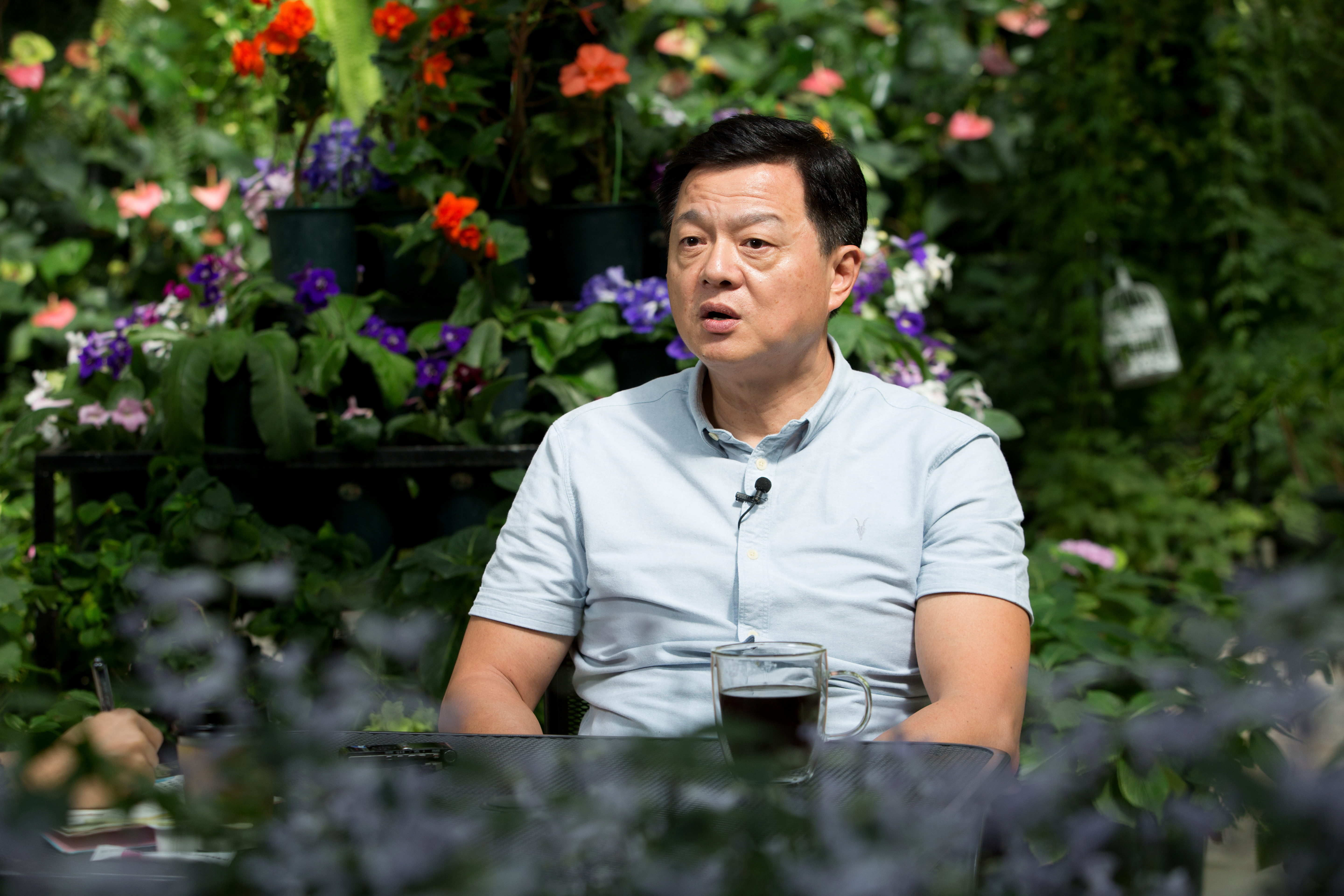 周錫瑋7年前淡出政壇潛心作畫、種花，近期將復出參選新北市長。他接受本刊專訪時暗批朱立倫7年市政，並要求公平初選。