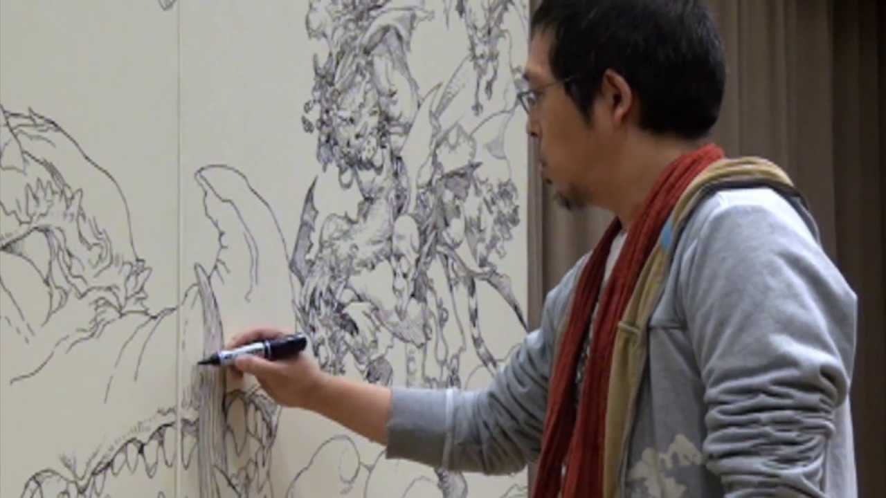 寺田克也現場作畫的情景。圖片來源：https://www.youtube.com/watch?v=FkibRz6Isdc