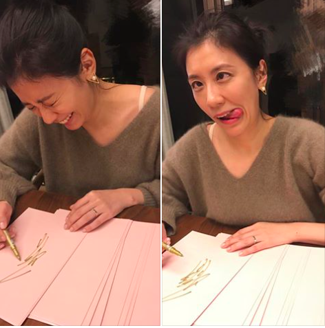 賈靜雯簽書簽到臉歪。（翻攝自賈靜雯臉書）