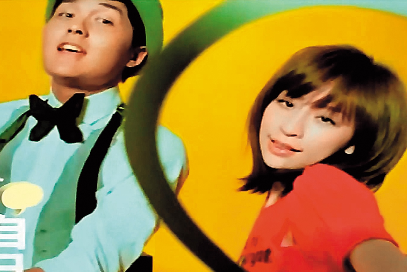 2007年吳克群曾傳出暗戀王心凌、還為她寫歌，隔年兩人合唱〈Na Na Na〉，在MV中打情罵俏。（翻攝自YouTube）