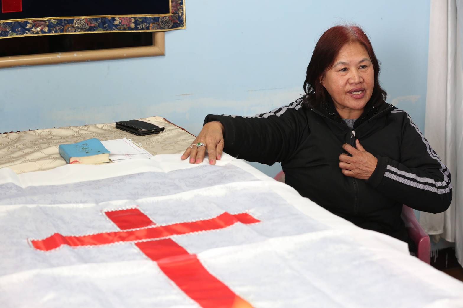 周媽媽相信周志軒是蒙主恩召，已經由天使接到天上和已過世的父親作伴。