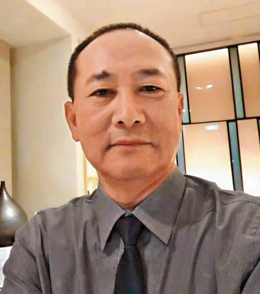 漂亮旅店員工江振昌直到死前一刻都還堅守崗位，他的遺體在櫃台被發現。（家屬提供）