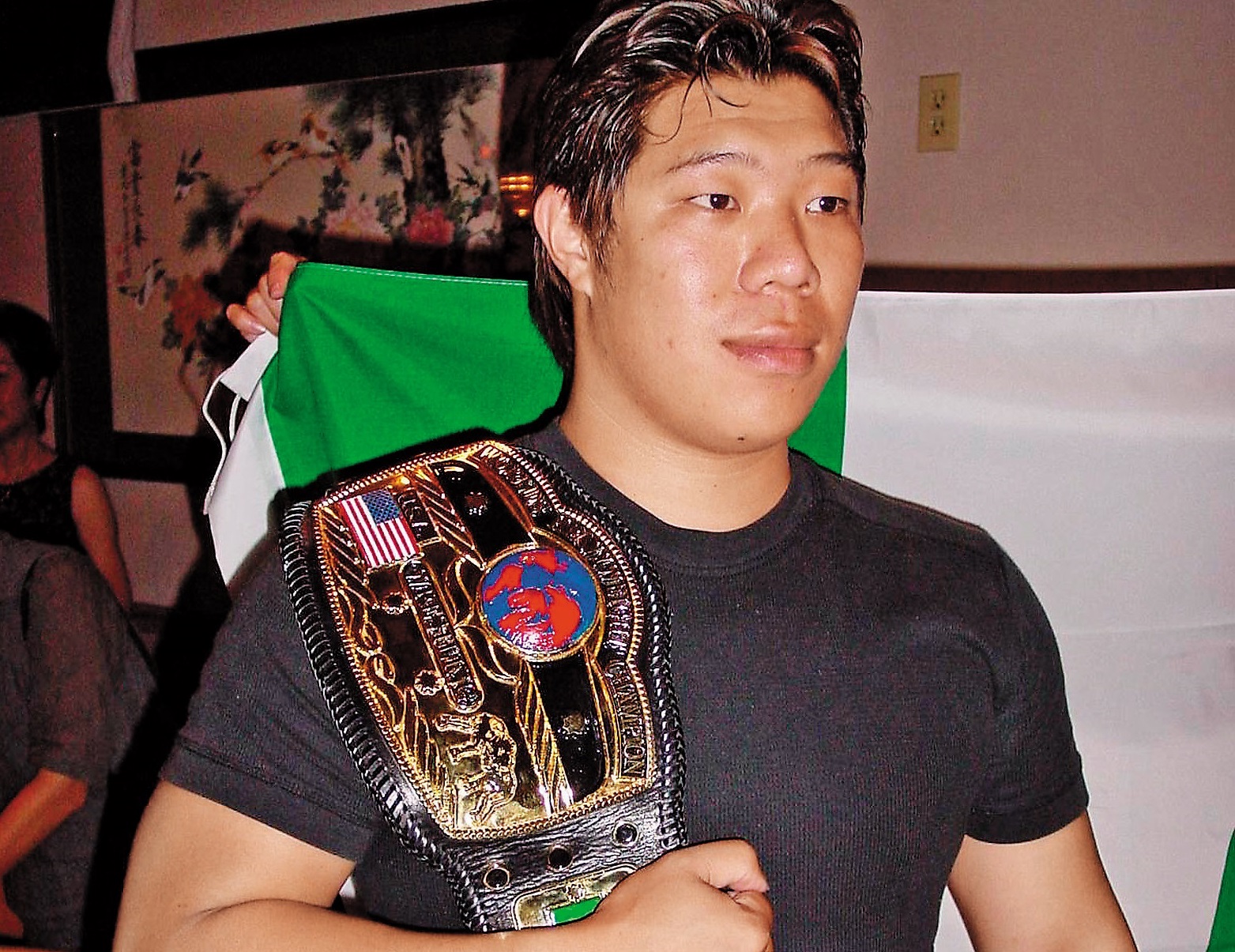 陳夆昀2002年在美國拿下IWS世界重量級摔角冠軍。（中央社）
