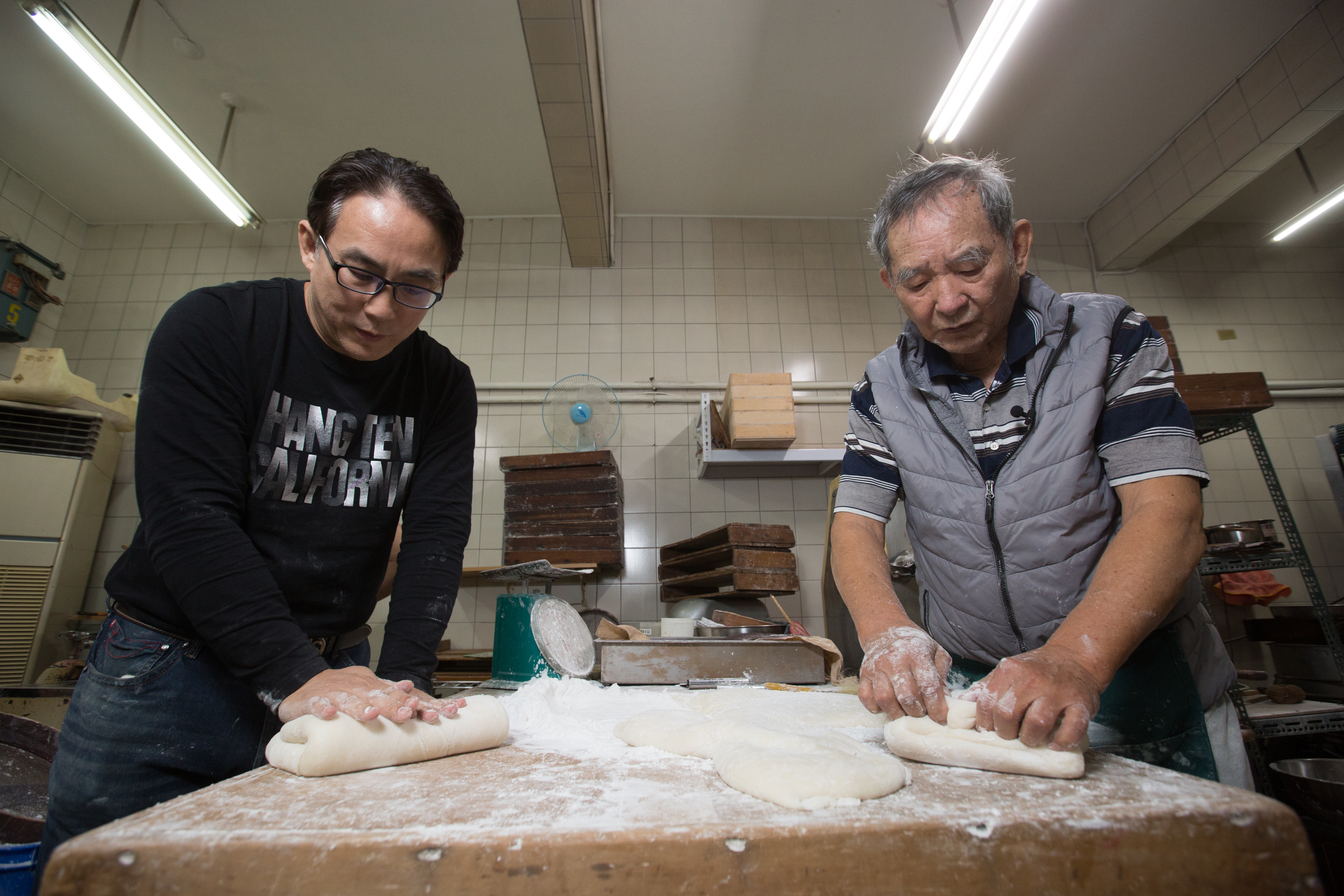 周宜文年過八旬，但年輕時日日搗米，打下結實的肌耐力底子。