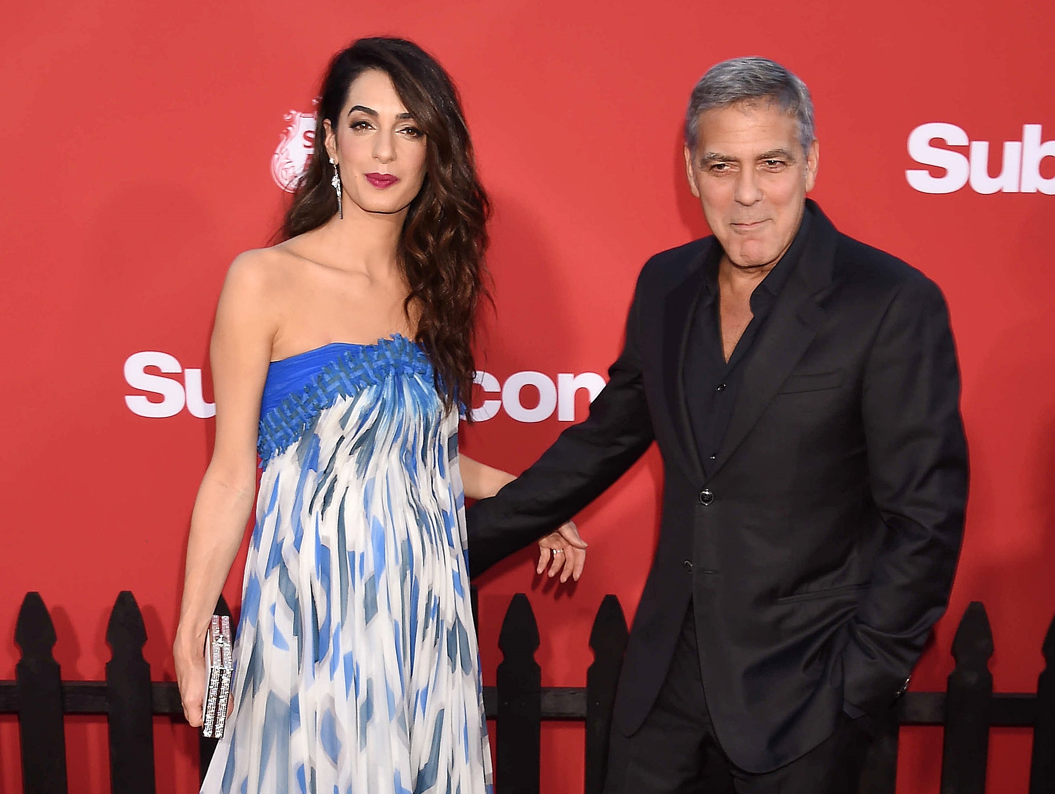 喬治庫隆尼與妻子艾瑪宣布捐出50萬美元支持遊行佛州槍擊案學生遊行。（東方IC）