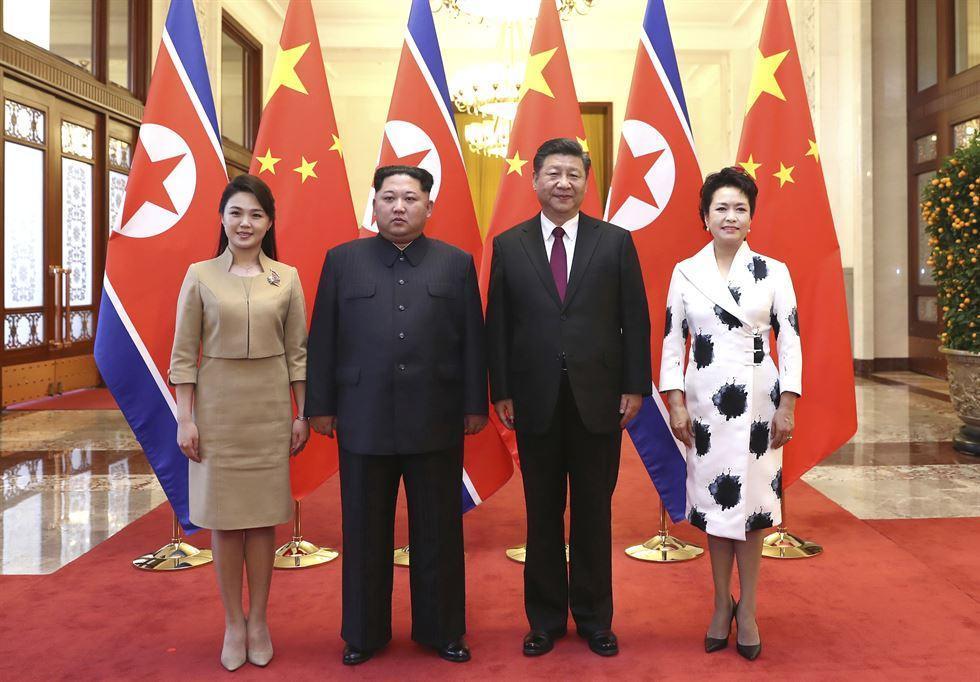 李雪主亮麗外型，與金正恩形成強烈對比。（擷自網路）