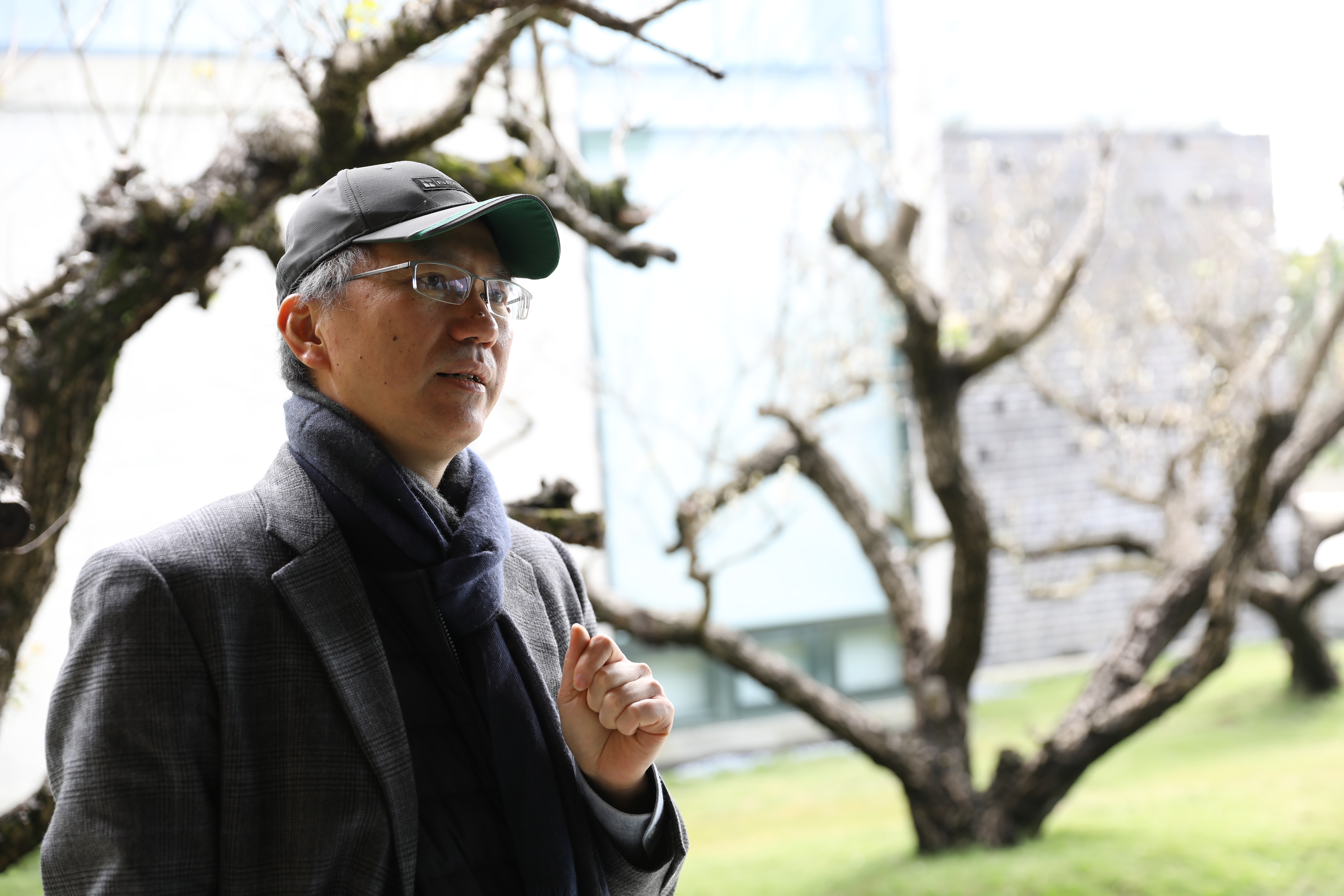 館長李足新一手催生美術館，他說，看不到的建築是最好的建築。