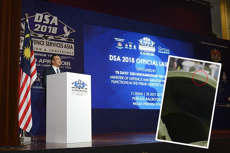 亞洲防務展4月在吉隆坡登場，但有民眾爆料，竟在展場中看到國軍新式抗彈頭盔出現在國外廠商的櫃位上。（讀者提供）