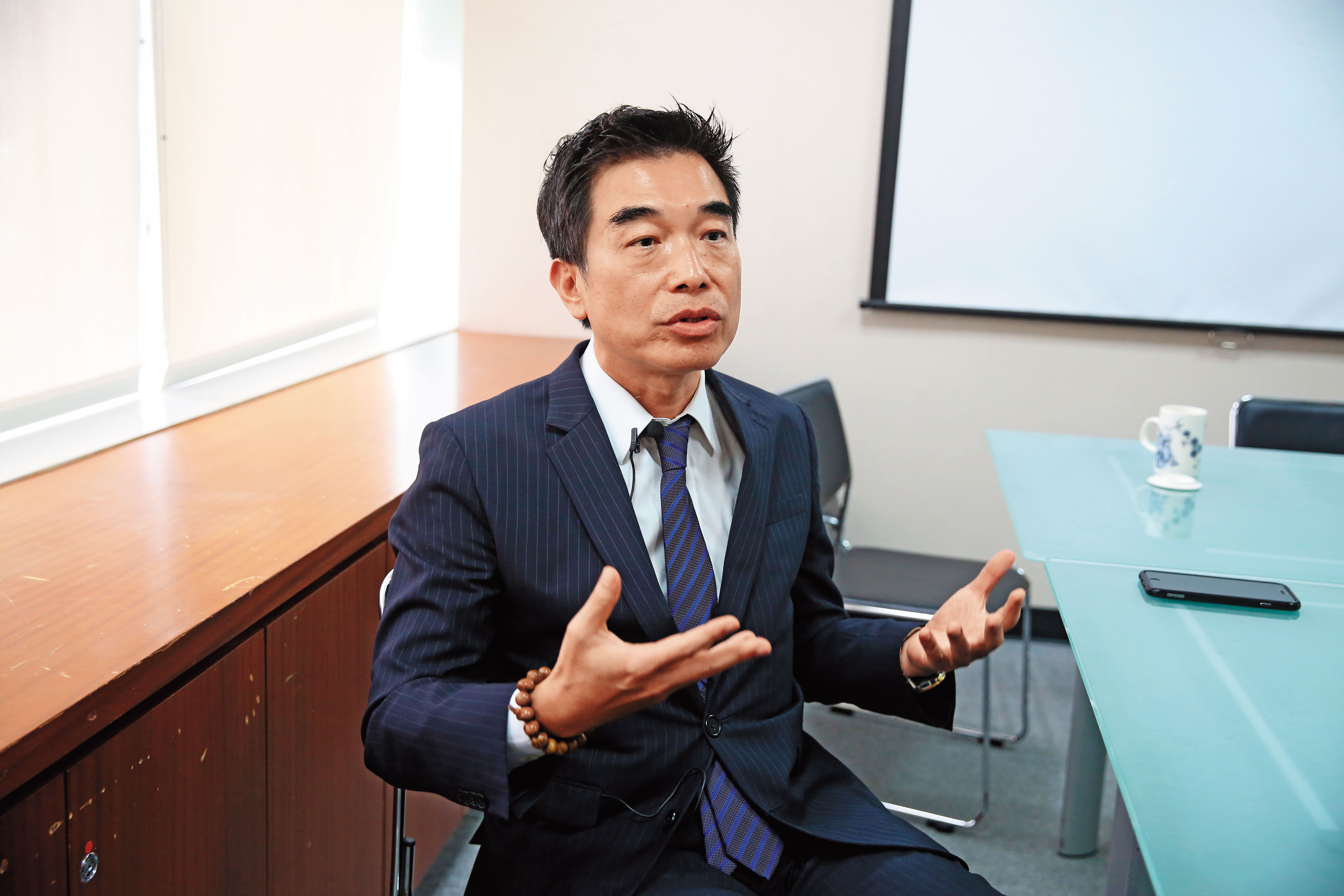 關貿網路公司董事長許建隆長年被汙名，連家人都遭威脅，讓他忍無可忍。