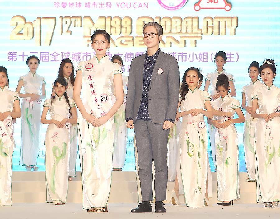 邱浚彥經常擔任選美評審，鼓勵年輕人要做自己。（全球城市小姐選拔協會提供）