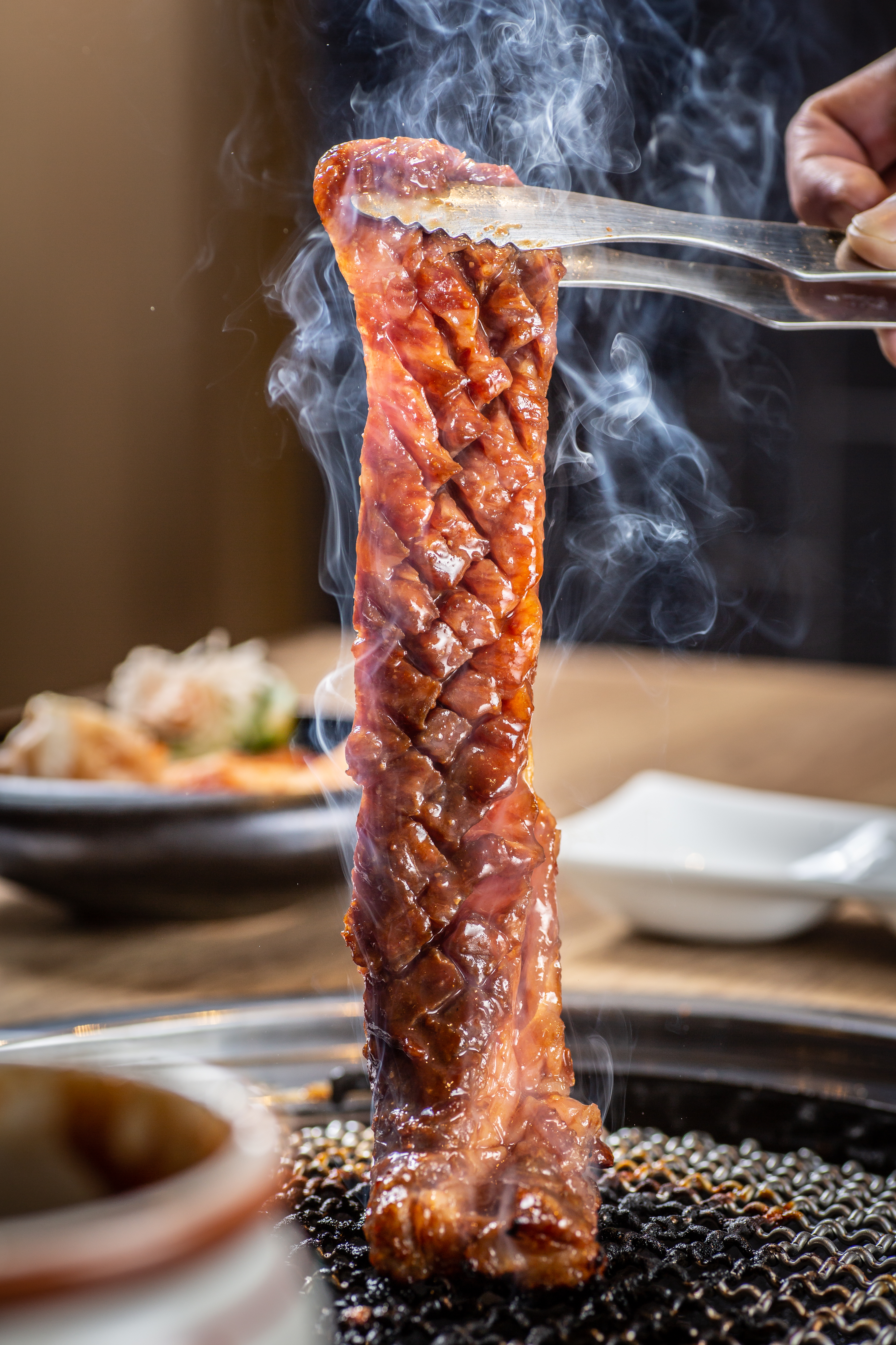 「骨山龍」是和牛肋間肉，烤起來醬香撲鼻。（550元／份）