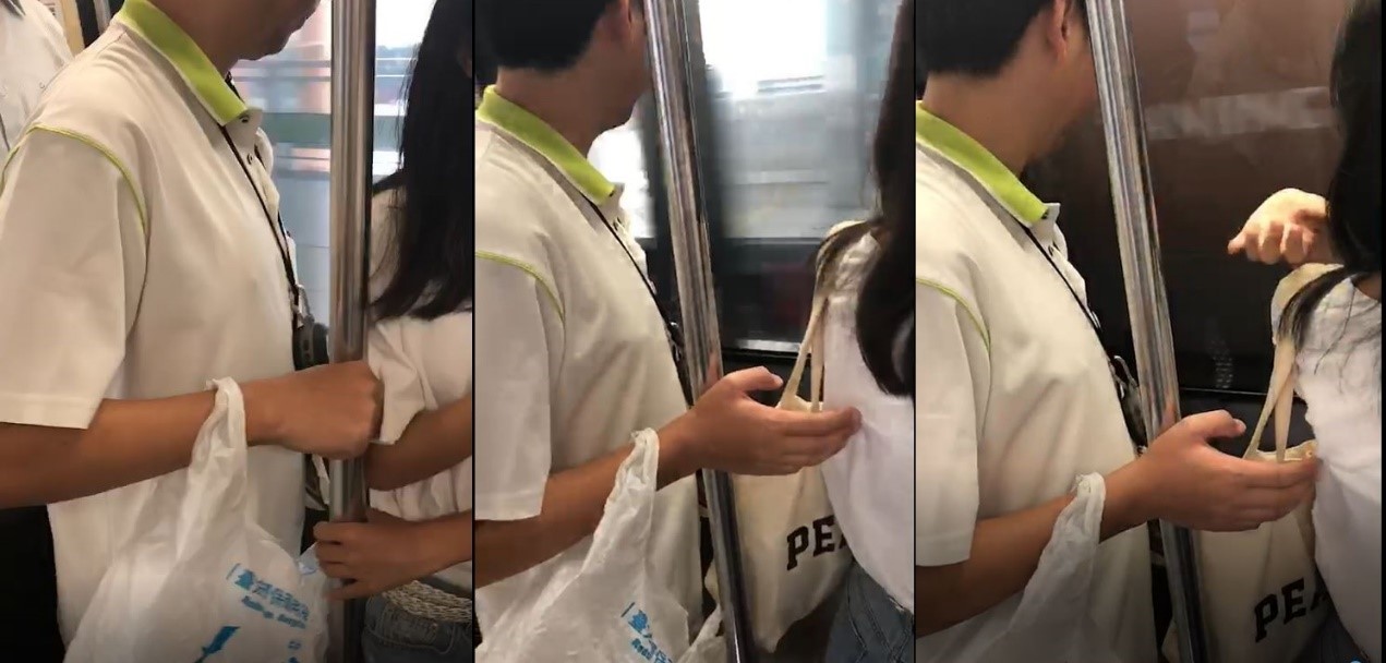 白衣男利用與女乘客錯身的機會，默默伸出兩根手指，對女乘客的背摳啊摳。（翻攝自爆料公社）