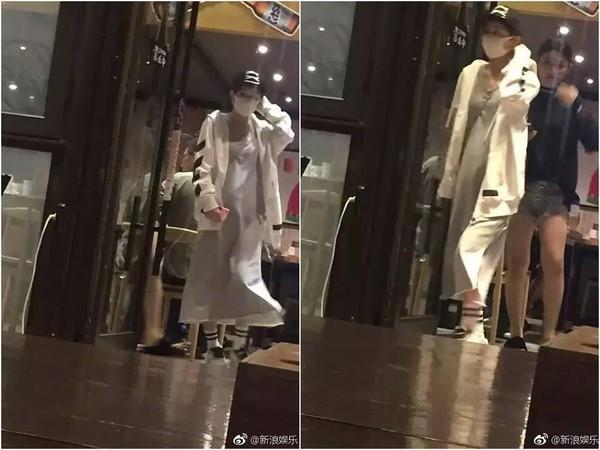 趙麗穎衣著寬鬆，小腹明顯隆起的模樣。（翻攝自新浪娛樂）