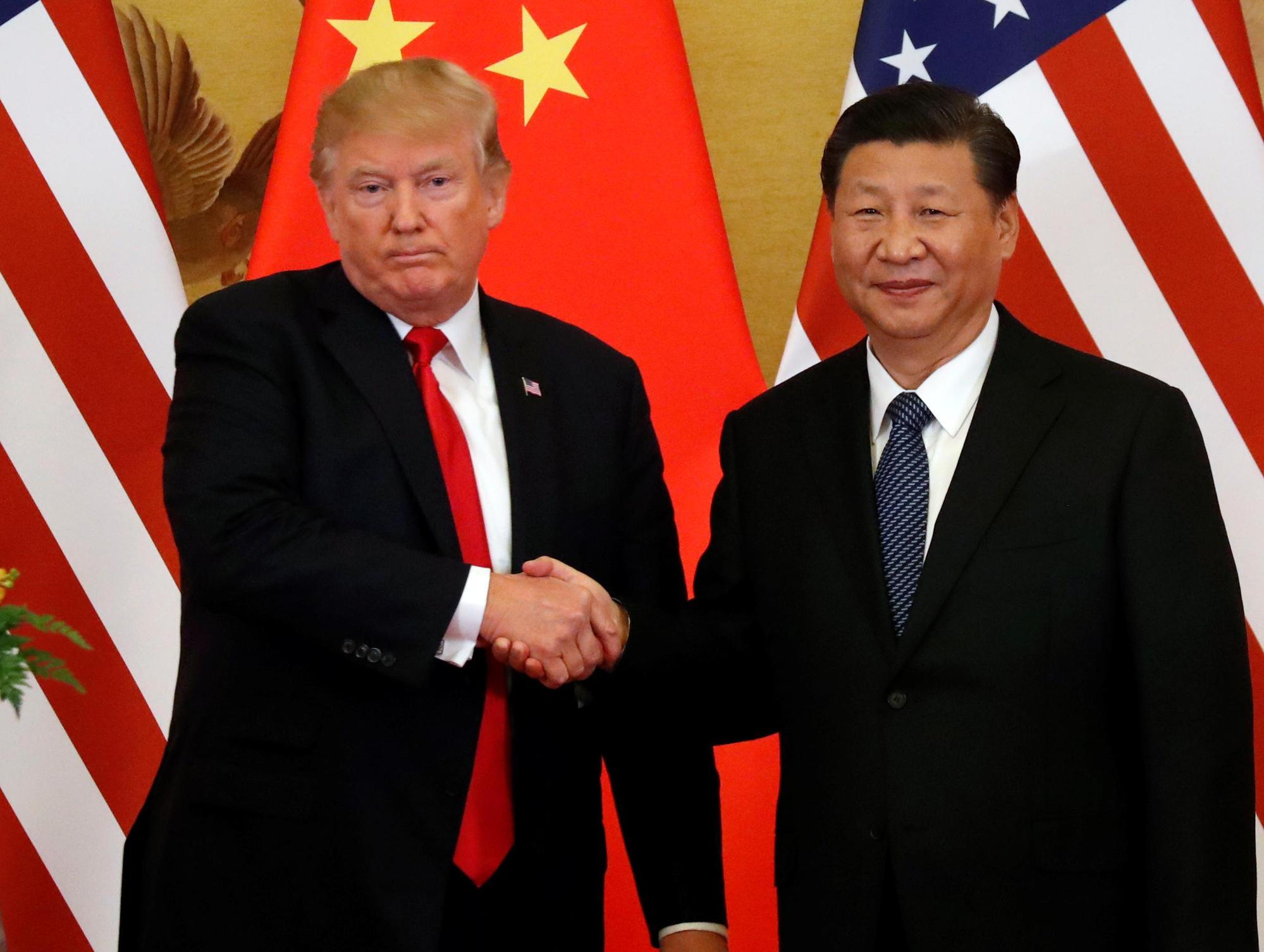美國總統川普主張保護主義,使中美貿易戰愈演愈烈,也讓全球經濟受動搖。(達志影像)