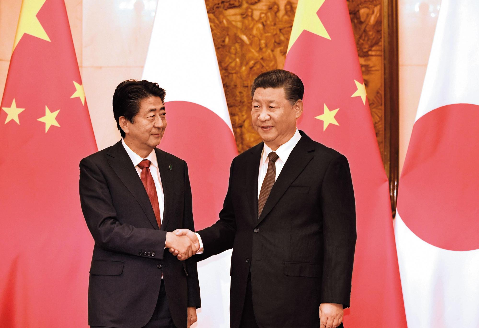 安倍晉三擔任首相7年間,日本與中國大陸關係持續緊張,此次訪中堪稱融冰之旅。(達志影像)