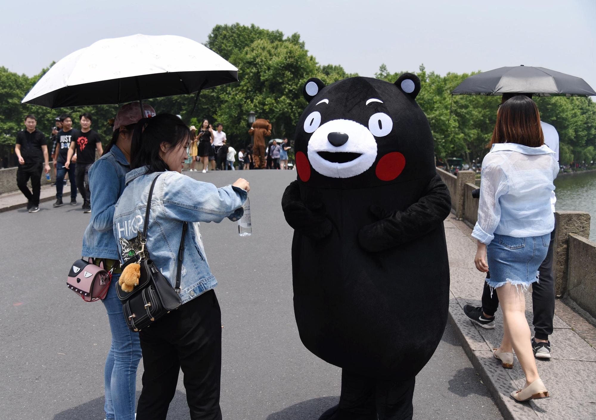 「熊本熊」官方名稱其實是「酷MA萌」,但官方名稱實在太不紅,讓熊本縣很困擾。(東方IC)