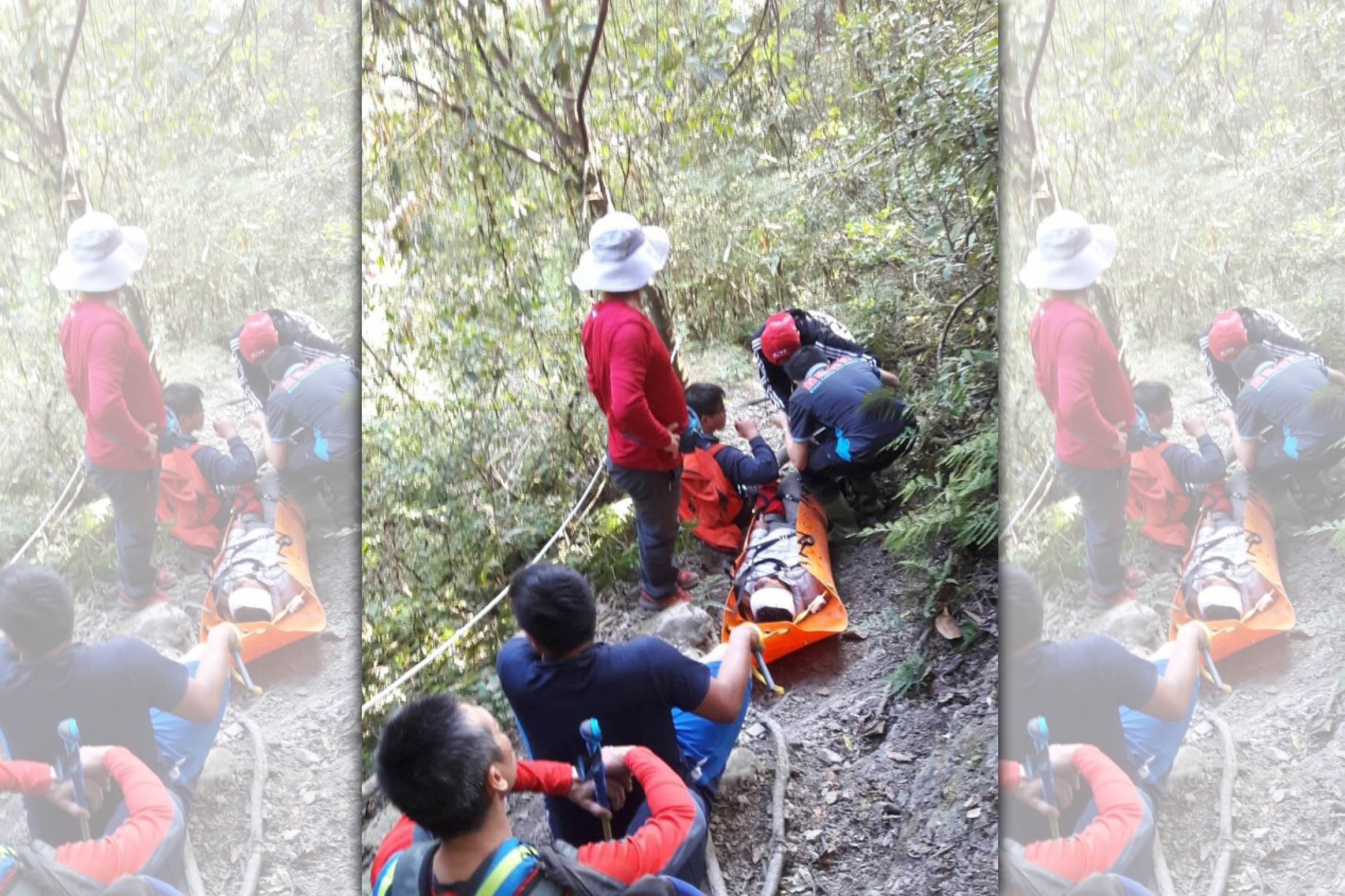 來自雲林縣的陳姓山友登山摔傷，苗栗警消人員花4個多小時將傷友運下山送醫。（消防局提供）