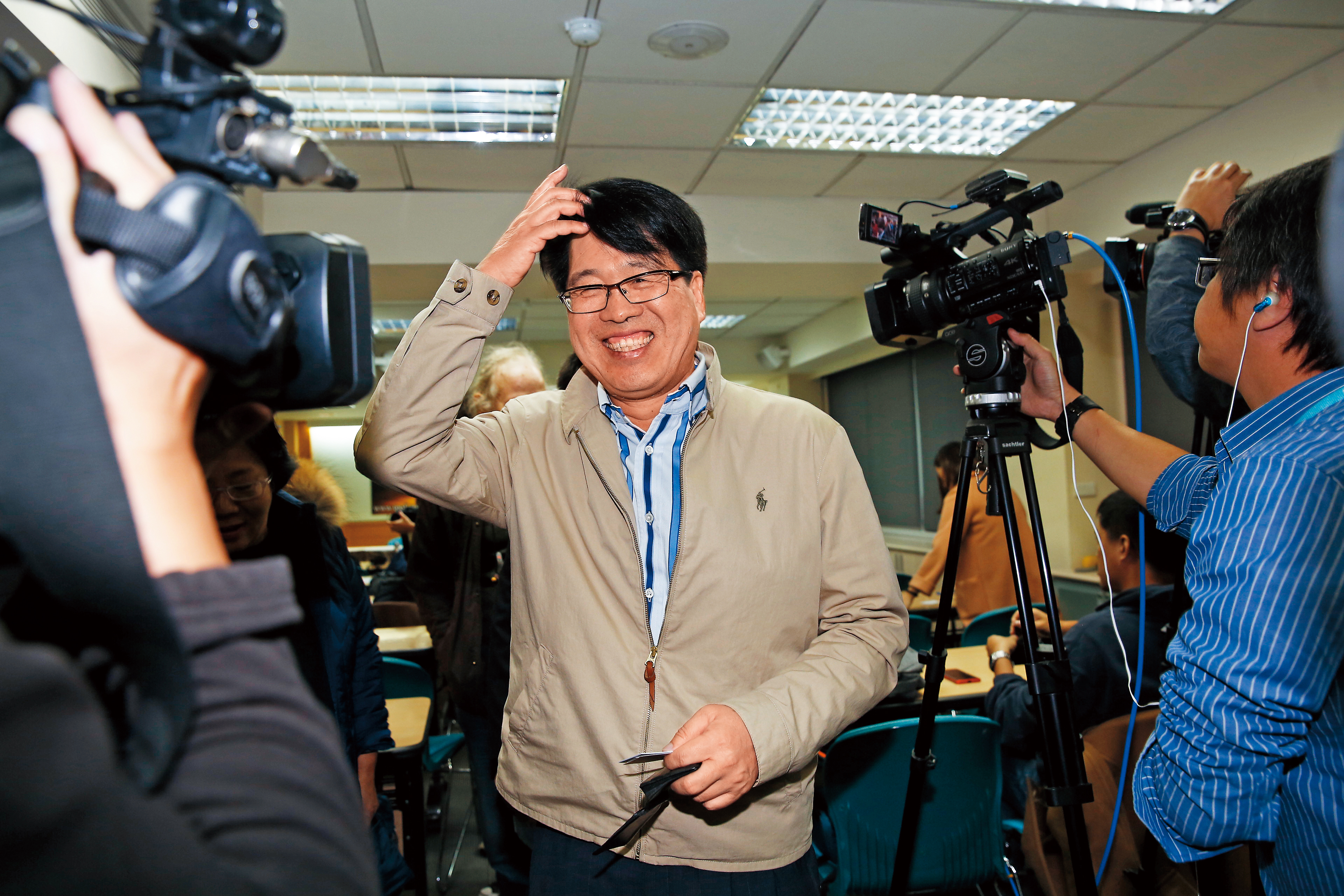 台灣民意基金會董事長游盈隆（圖）也登記參選民進黨主席，將與卓榮泰爭奪黨魁寶座。
