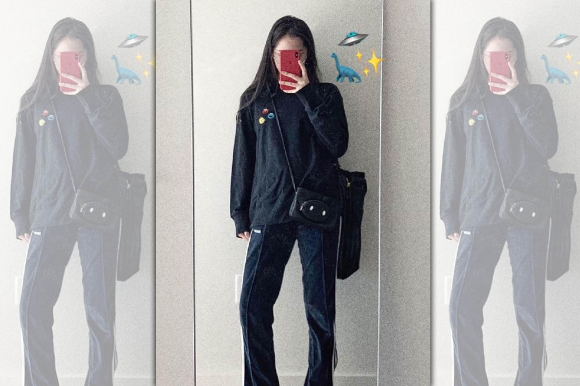 歐陽娜娜配戴Longchamp豬年限定黑色手拿包,展現少女氣質俏皮可愛。〈Longchamp提供〉